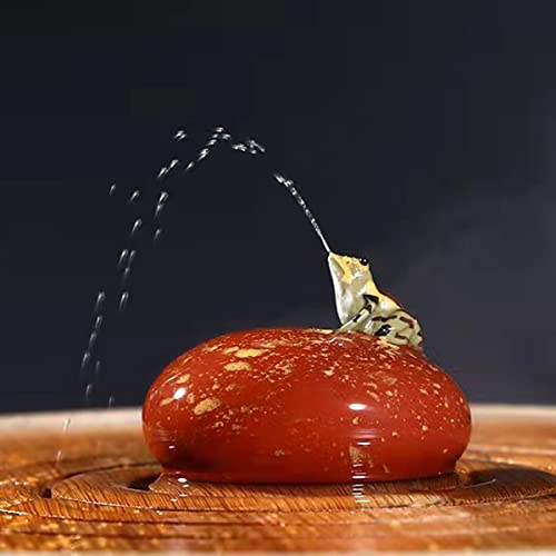 6.Spray frog and round pebble vermilion