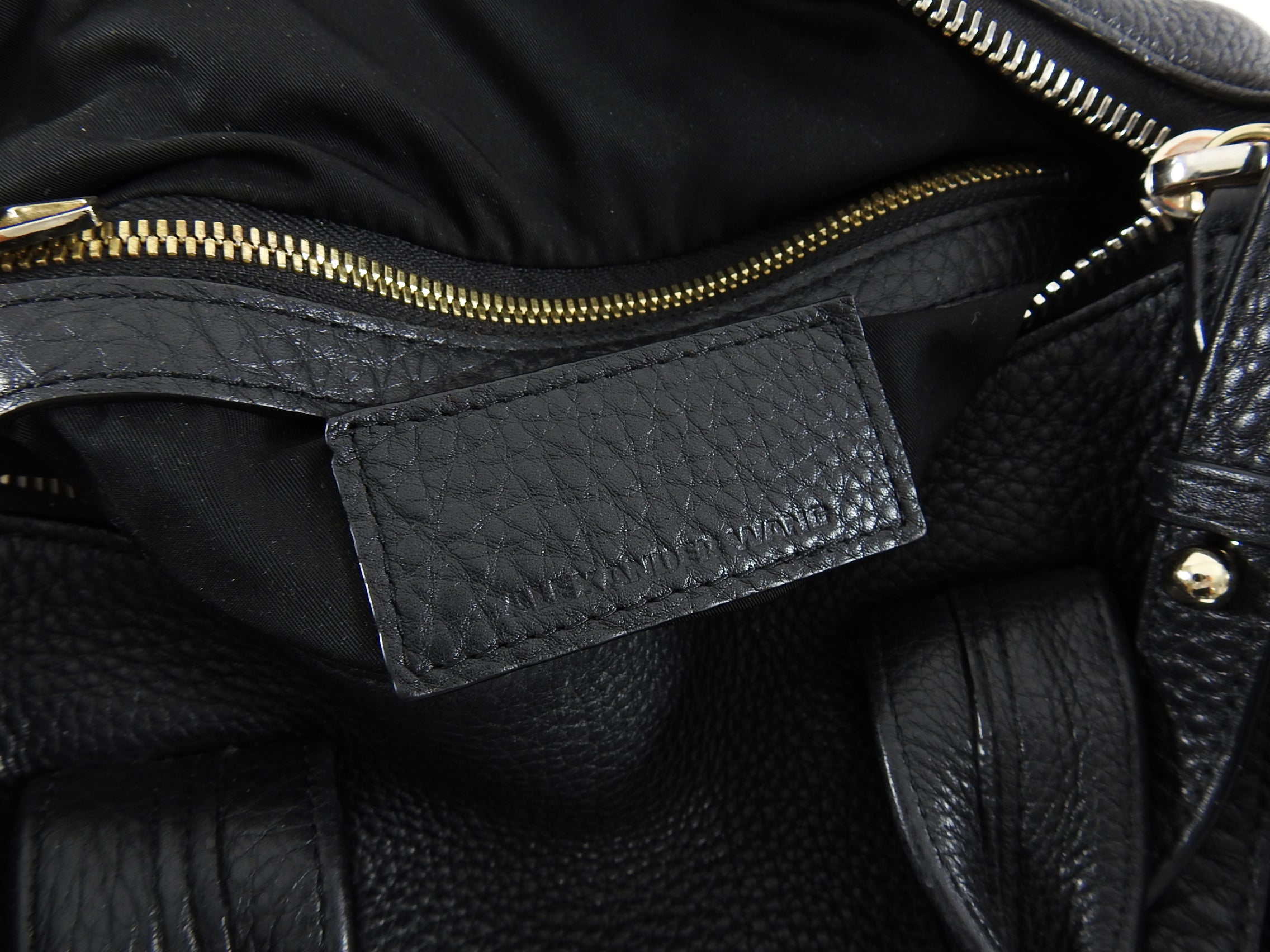 Alexander Wang Black Leather Rocco Bag with Gold Studs - Stylish Designer Handbag for Women, Perfect for Evening Parties & Daily Use