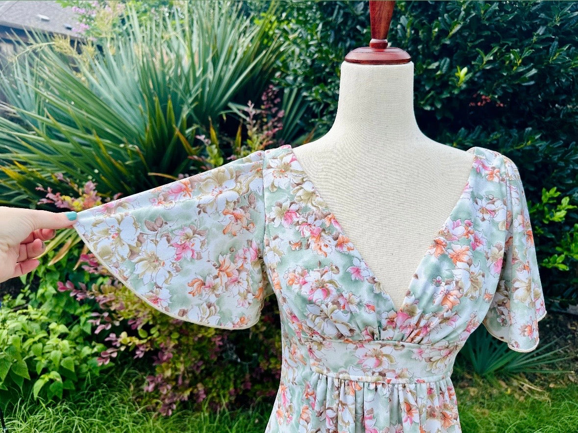 Vintage 1960s Orange & Pink Floral Maxi Dress - Nancy G Flower Empire Waist V-Neck Summer Long Dress with Flutter Sleeves | Retro Boho Chic Outfit for Beach Wedding, Music Festival & Vintage Theme Party