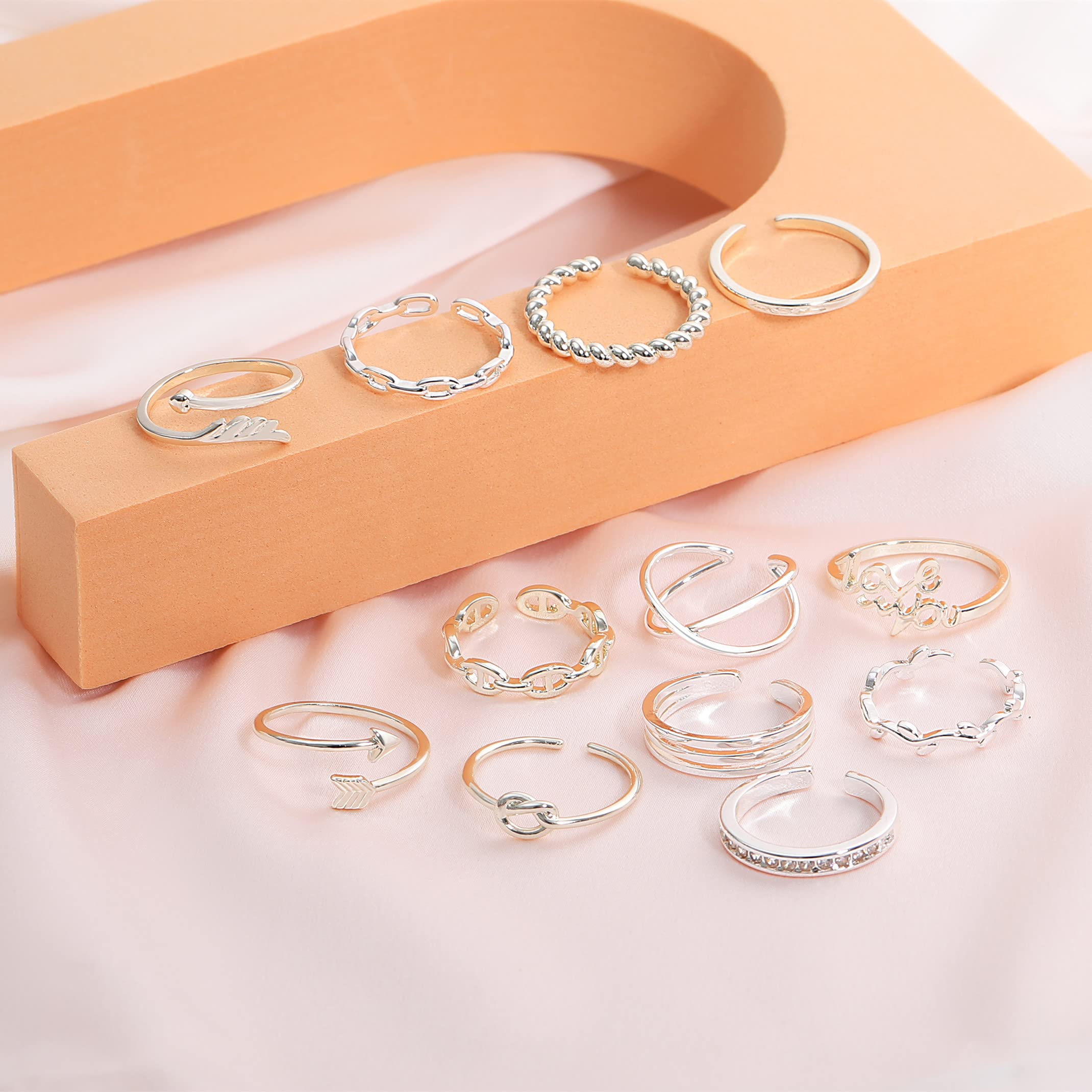 Honsny 12PCS Adjustable Rings for Women - Silver Arrow Knot Wave Star Moon Open Stackable Rings Set for Teens | Trendy Finger Jewelry for Daily Wear, Parties & Gifts