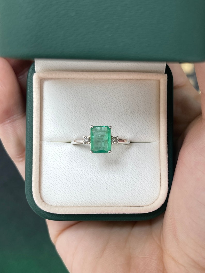 1.70 TCW SS Medium Green Emerald Cut Diamond & Round Brilliant Accent 3-Stone Sterling Silver Ring for Women – Elegant Gift for Engagement, Anniversary, or Special Occasions