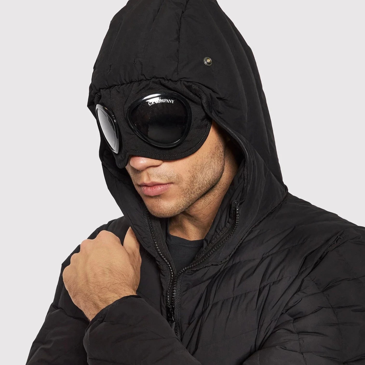 C.P. Company Black Goggle Monoblock Jacket - Waterproof Windbreaker with Detachable Hood for Urban Commuting & Outdoor Adventures