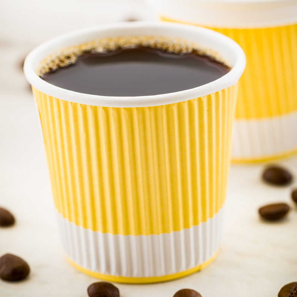 Eco-Friendly 4 oz Light Yellow Paper Coffee Cups with Ripple Wall Design - 2.5