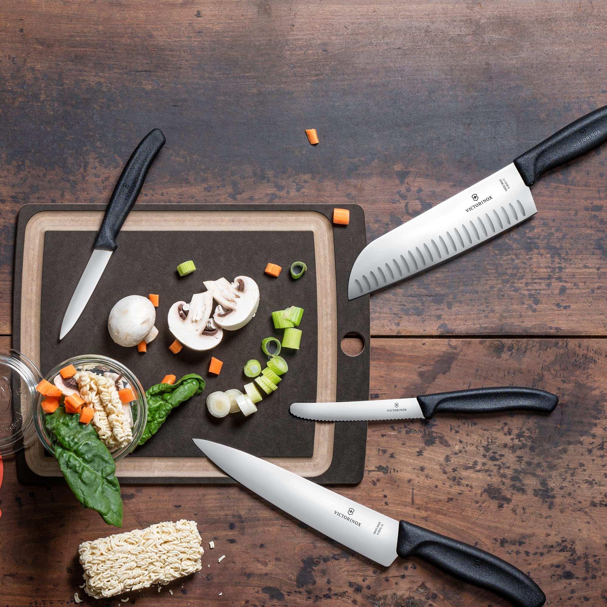 Victorinox Santoku Knife 7-Inch - High Carbon Stainless Steel Blade with Ergonomic Black Handle - Professional Kitchen Knife for Chopping, Slicing & Dicing Vegetables, Meat & Fish