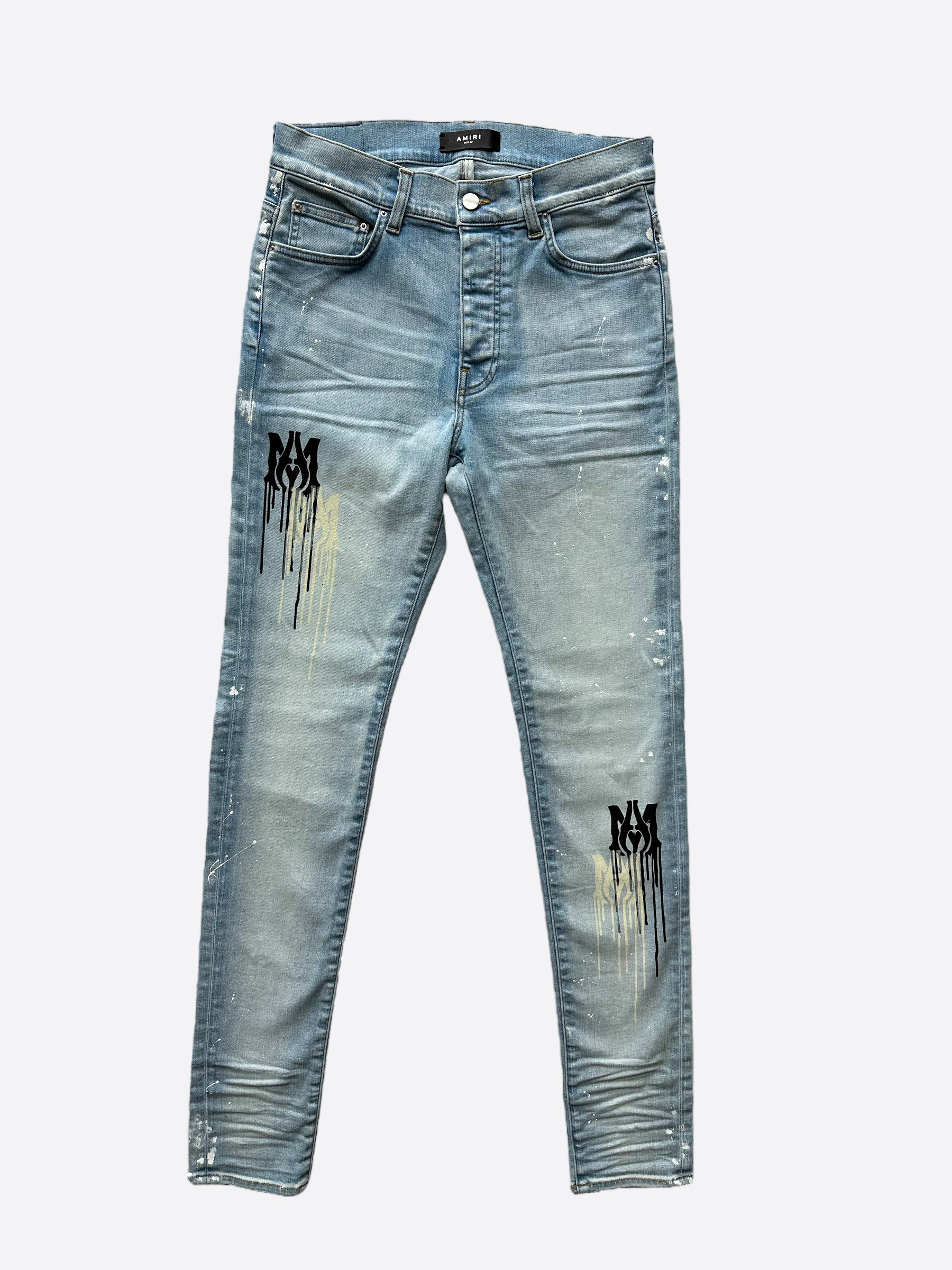 Amiri Blue MA Logo Stencil Jeans - Distressed Denim Pants for Men | Streetwear Fashion | Perfect for Casual Outfits & Night Out