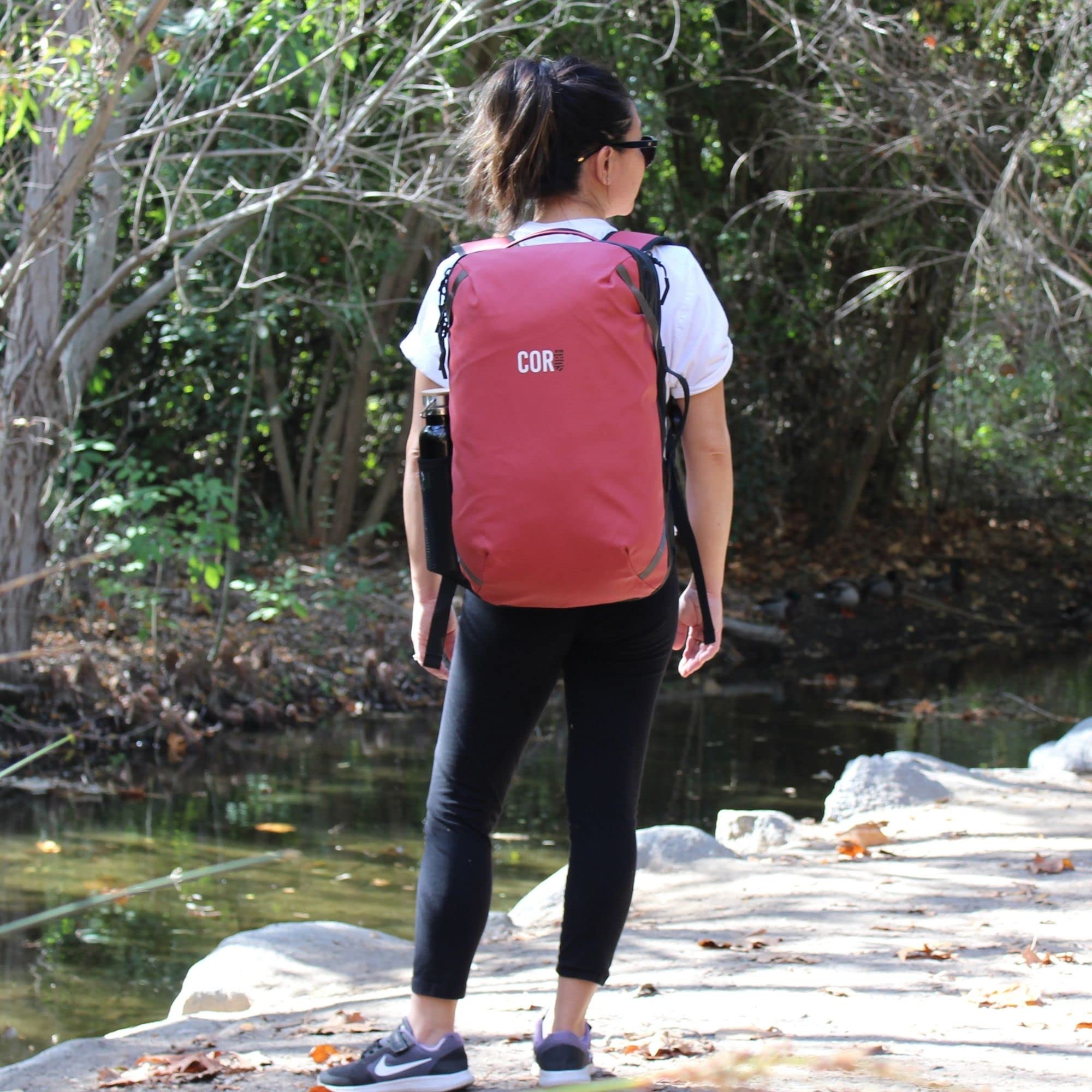 COR Surf Travel Backpack - TSA Approved 28L Carry On Laptop Backpack with Hidden Passport Pocket & USB Charging Port | Water Resistant Lightweight Daypack for Business Travel, Beach Vacation & Commuting (Lava Red)
