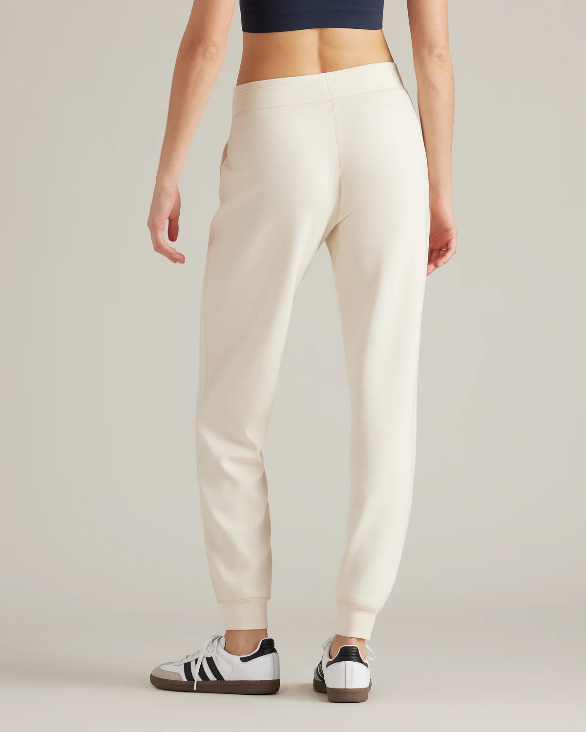 Rhone Women's Dreamglow Joggers - Soft High-Waist Yoga Pants for Running, Lounge & Travel - Sand Color