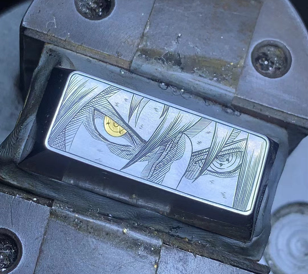 Hand Carved Uchiha Sasuke Sharingan Titanium Alloy Keycap with Gold Inlaid Eyes - Perfect for Mechanical Keyboards, Gaming Setups & Anime Collectors