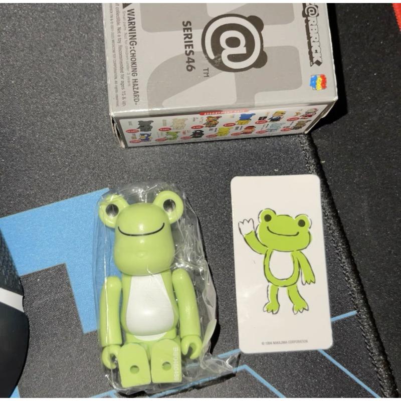 Bearbrick Series 46 Pickles The Frog 100% Collectible Vinyl Art Toy - Limited Edition Designer Figure for Display & Gift Giving - Perfect for Anime Fans, Kawaii Decor, and Pop Culture Collectors
