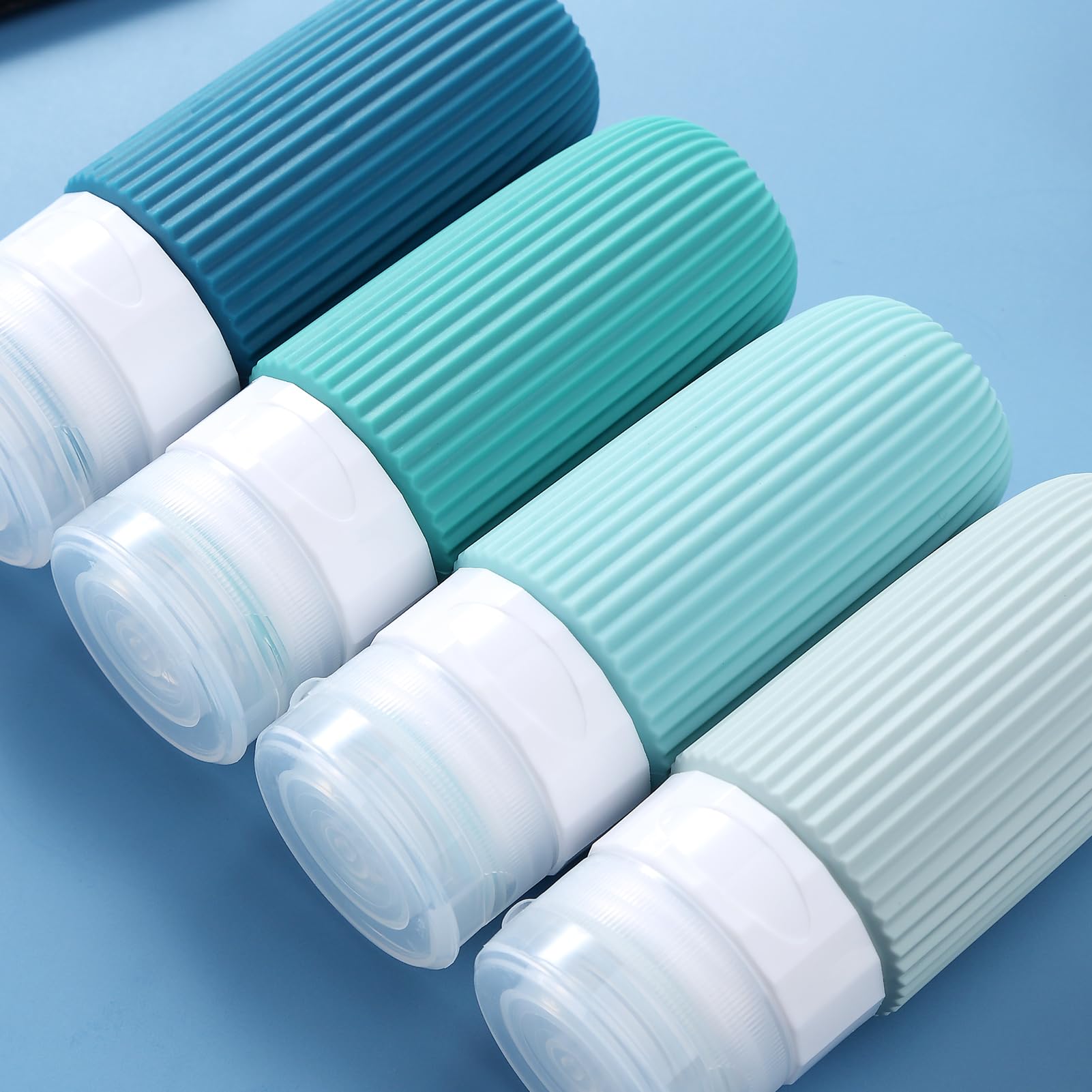 TSA Approved 2oz Travel Bottles for Toiletries - BPA Free Leak Proof Refillable Containers with Toiletry Bag (4 Pack) - Perfect for Air Travel, Gym, Camping & Shampoo Storage