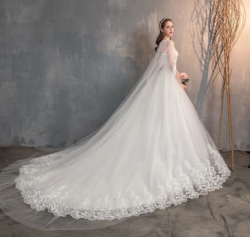 Elegant Long Sleeve Lace Wedding Dress with Long Train & Embroidery - Plus Size Princess Bridal Gown for Church, Beach, or Ballroom Ceremonies