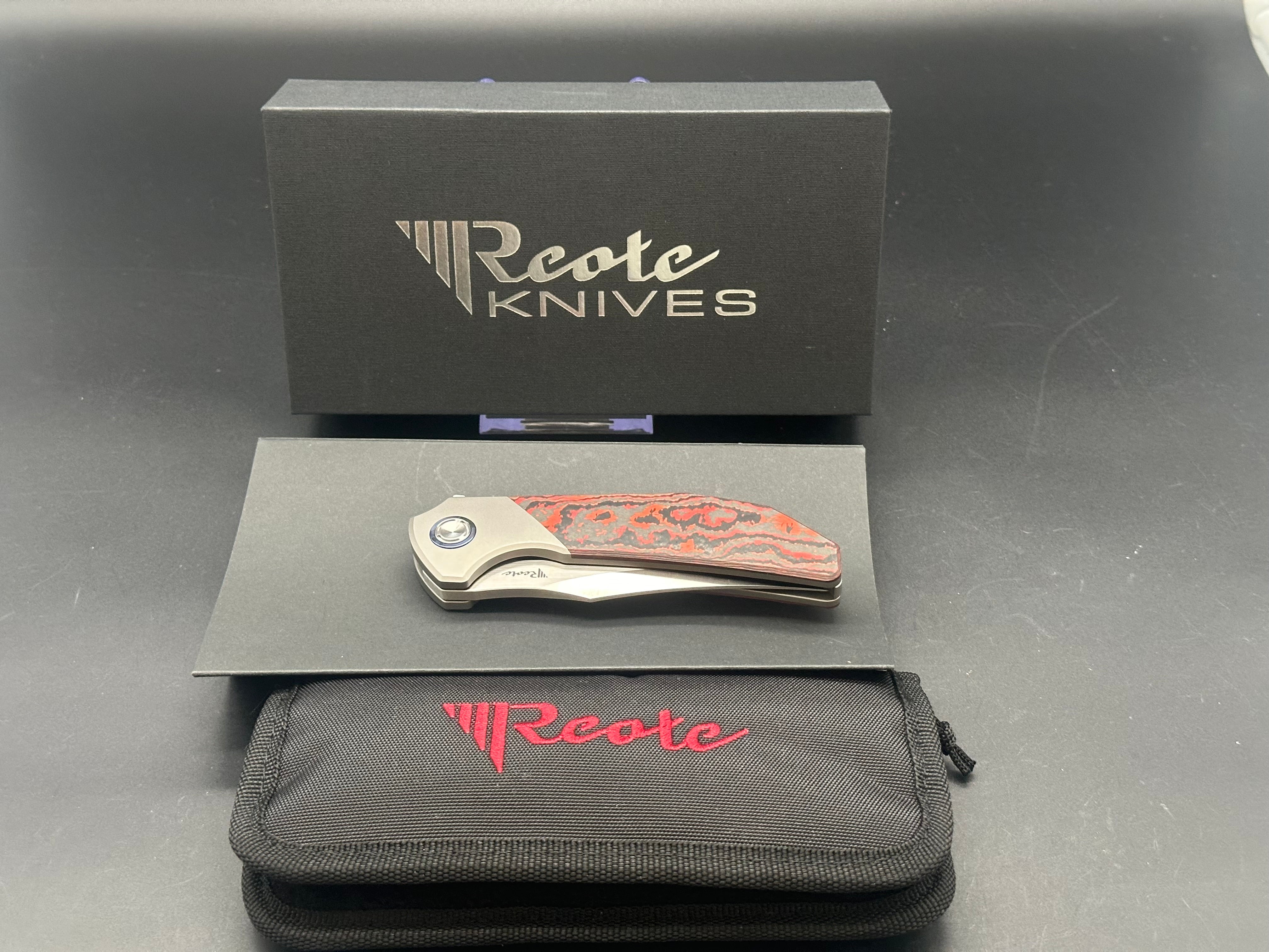 REATE KNIVES TIGER LAVA FLOW Folding Pocket Knife - M390 Steel Plain Edge Blade, Fat Carbon Fiber Handle, Belt Satin Finish | EDC, Outdoor Survival, Camping, Hunting Gear