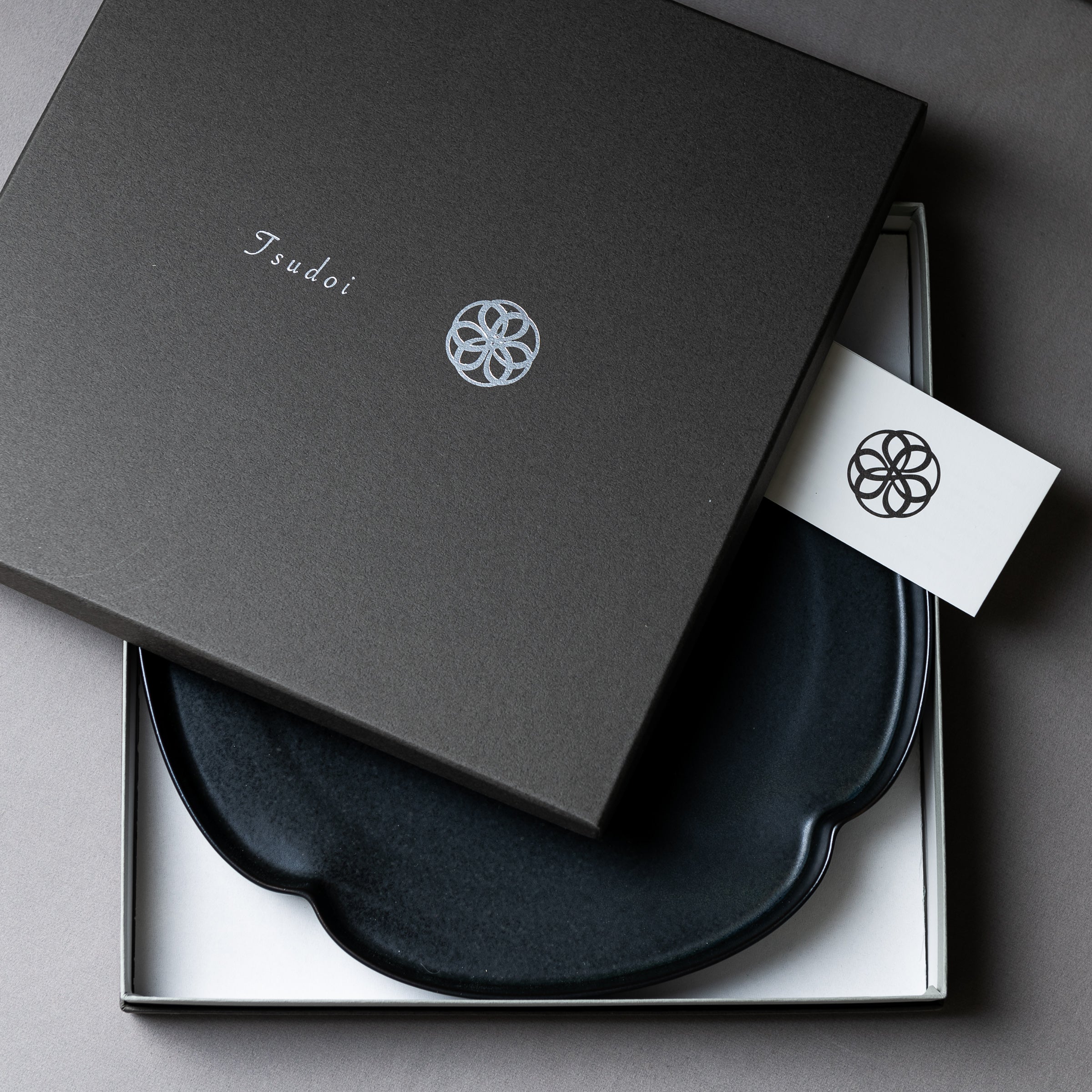 Tsudoi Shallow Plate - Clover & Matte Black Ceramic Dish for Sushi, Appetizers & Desserts | Elegant Japanese Tableware for Home Dining & Party Serving