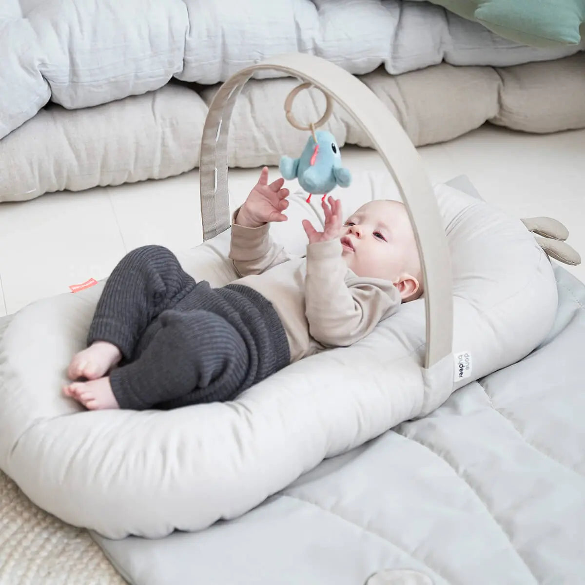 DONE BY DEER Cozy Baby Lounger with Activity Arch & Raffi Toy - Soft Infant Seat for Playtime, Tummy Time & Relaxation - Perfect for Newborns & Babies 0-12 Months