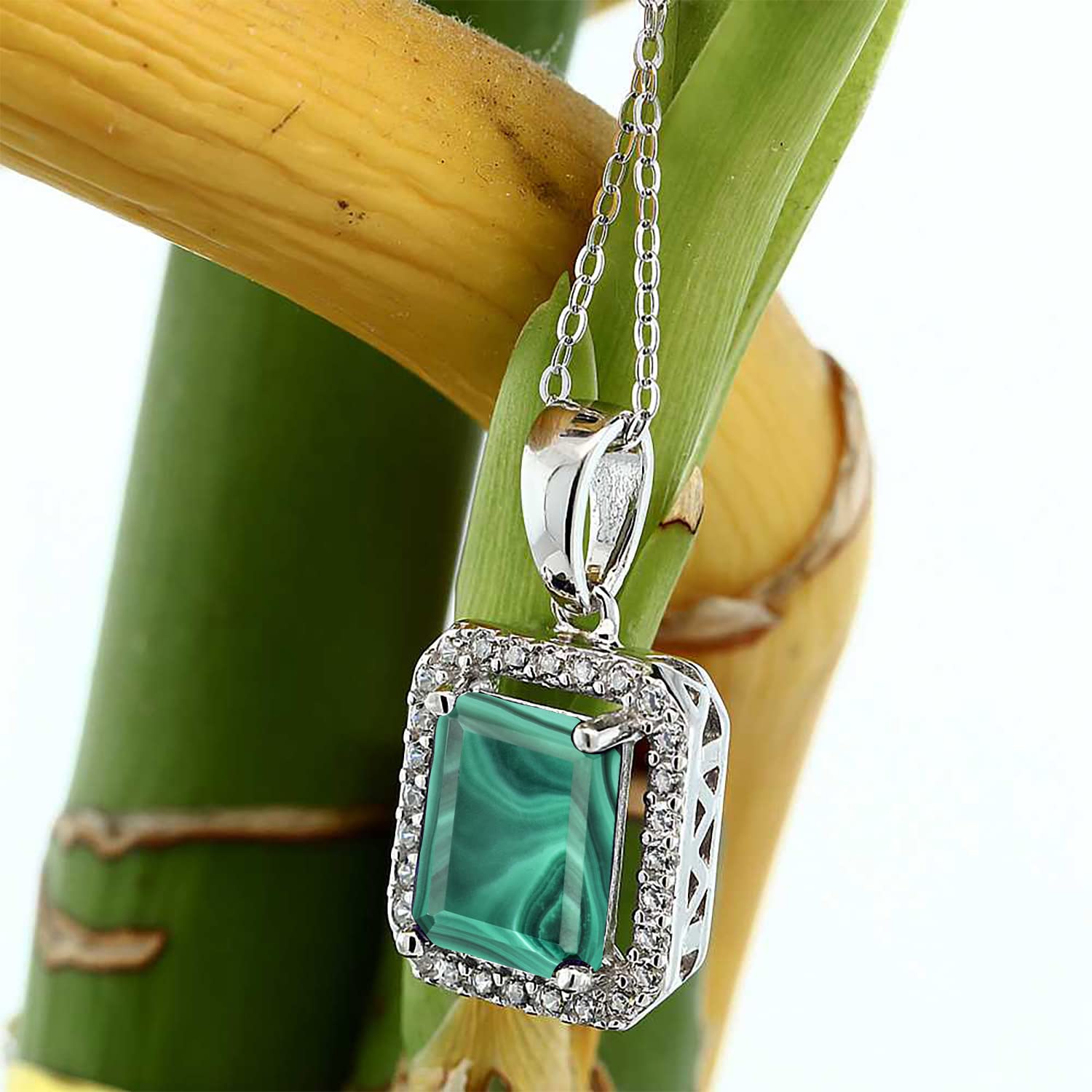 Gem Stone King 925 Sterling Silver Emerald Cut 9X7MM Birthstone Halo Pendant Necklace for Women with 18 Inch Silver Chain | Perfect Gift for Birthday, Anniversary & Mother's Day | Elegant Jewelry for Everyday Wear & Special Occasions