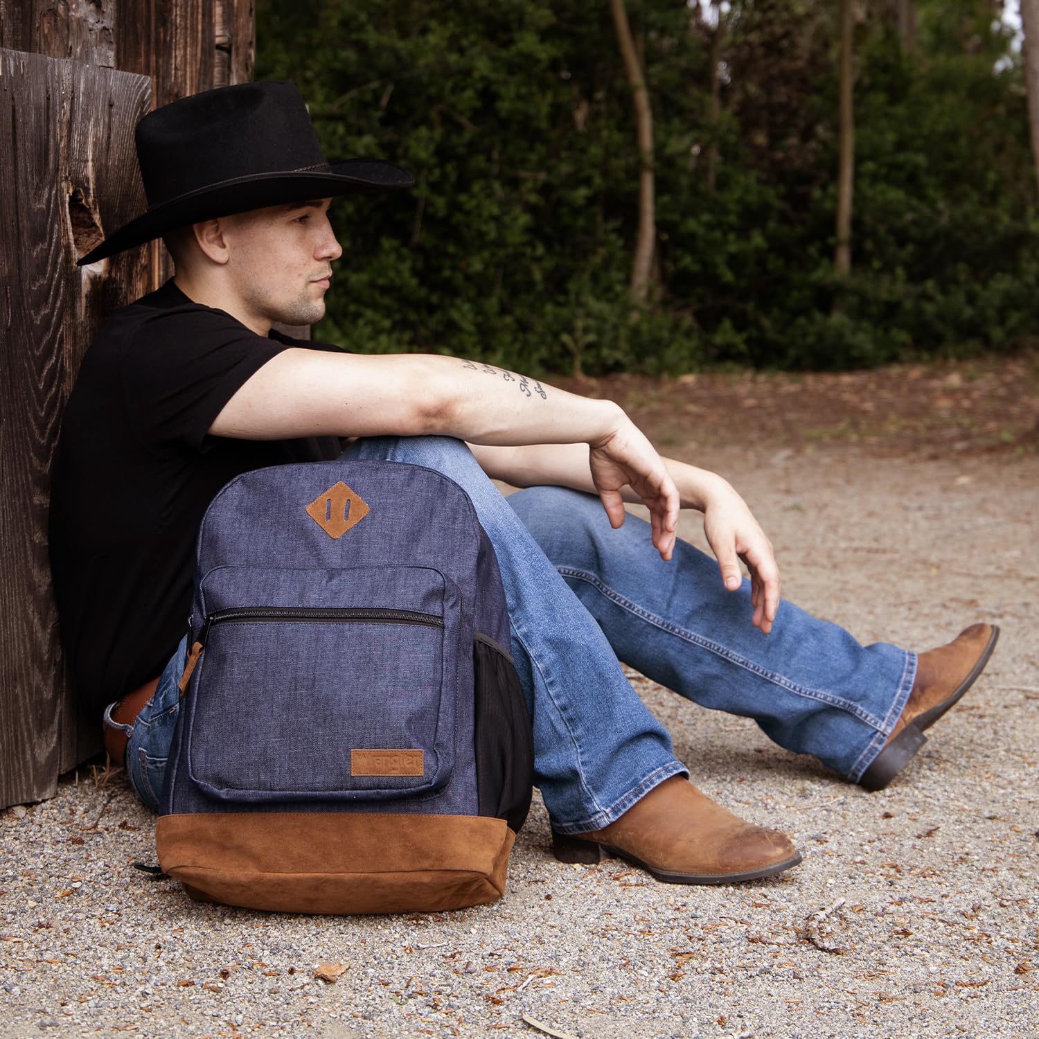 Wrangler Yellowstone Genuine Denim Backpack - Durable Travel Daypack with Padded Laptop Sleeve (15.6 Inch), Classic Logo Design - Navy Blue Denim - Perfect for School, Work, Hiking & Outdoor Adventures