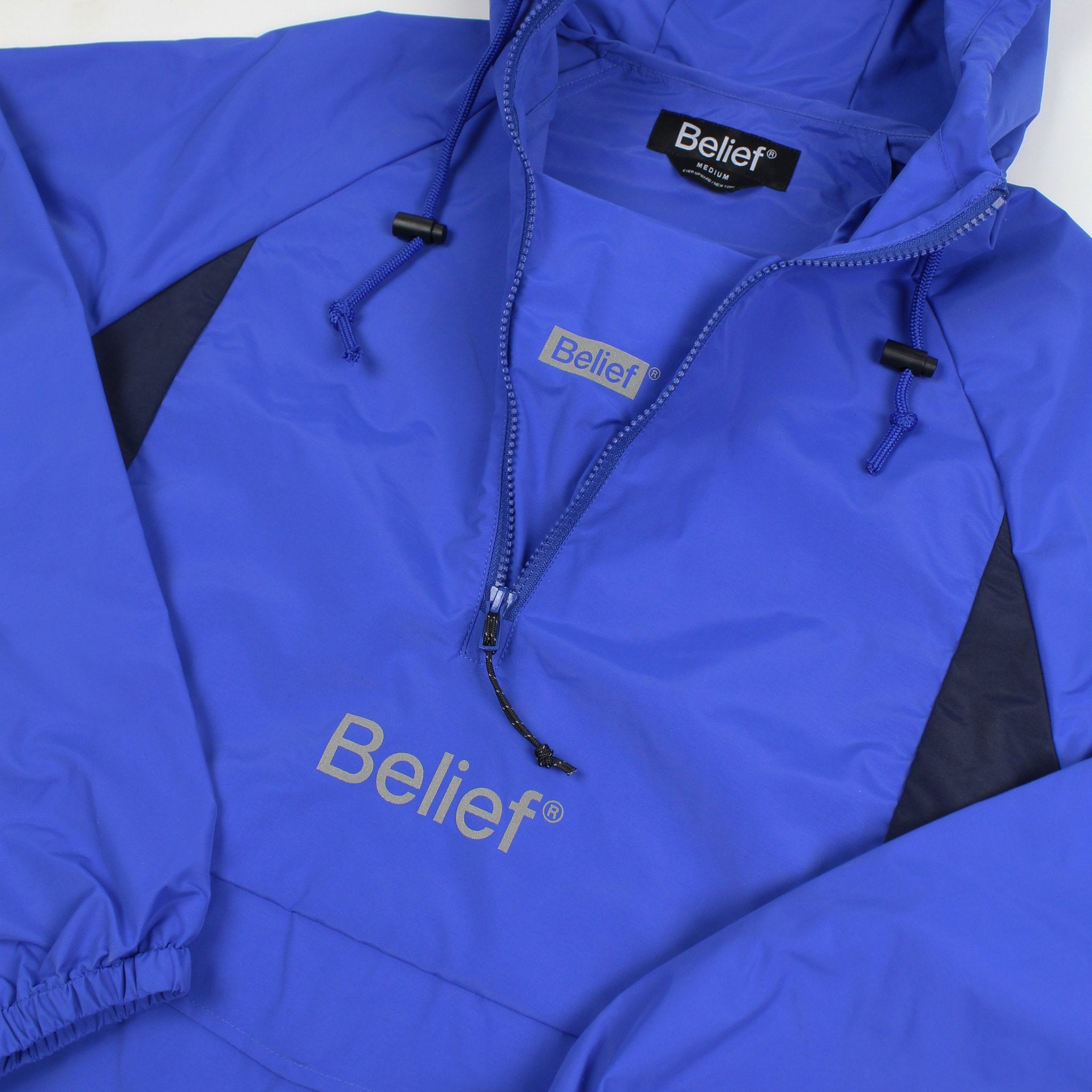 Belief NYC Sport Logo Anorak Jacket - Royal Blue Windbreaker for Men & Women | Outdoor Running, Hiking & Casual Wear