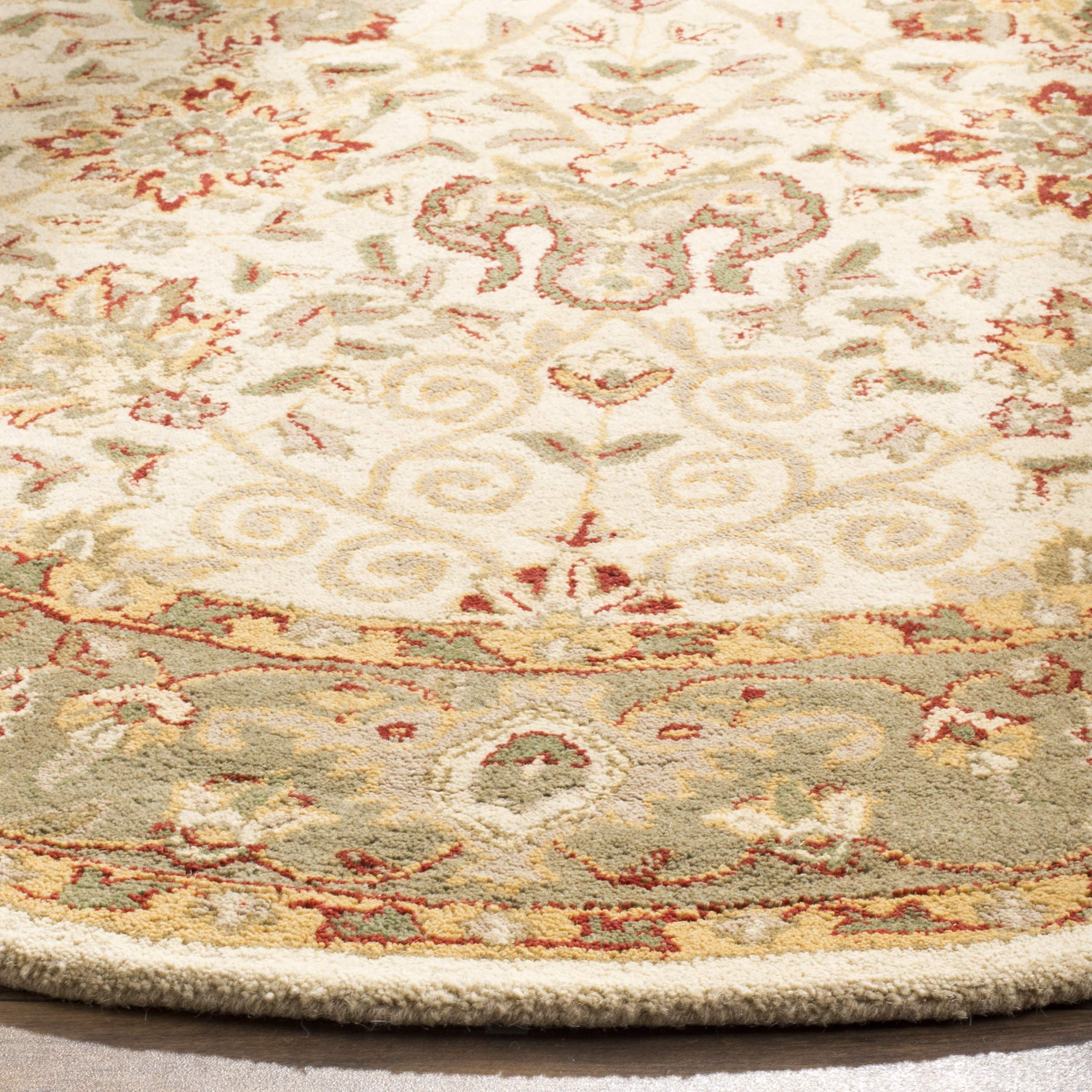 SAFAVIEH Antiquity Collection 6-Foot Round Ivory Wool Area Rug - Handmade Traditional Oriental Design for Living Room, Bedroom & Dining Room Decor