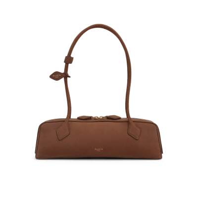 The Journey of Elegance: A Tale of the Premium Nubuck Calfskin Medium Dachshund Bag