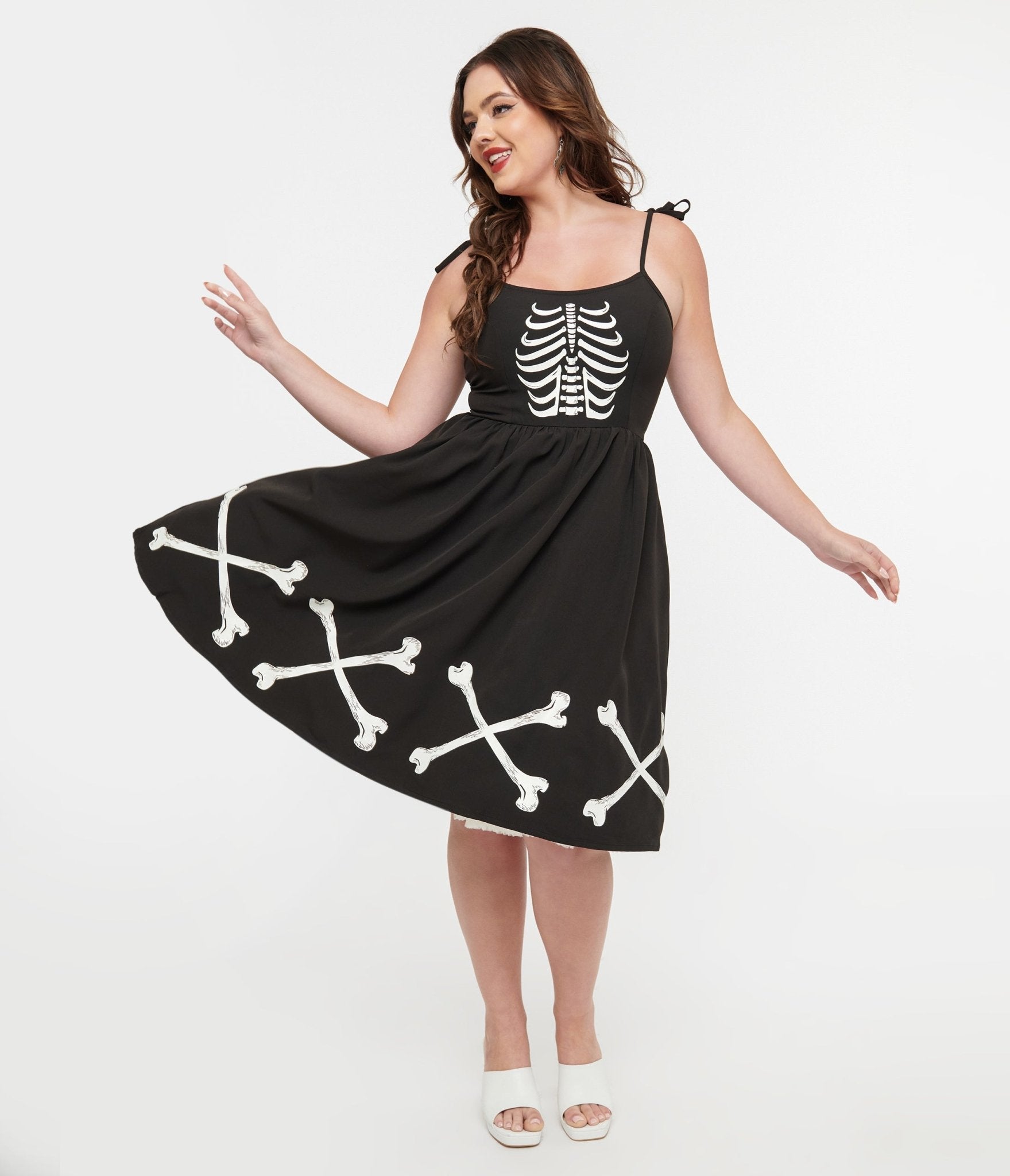 Vintage 1950s Black Swing Dress with Glow-in-the-Dark Skeleton Print - Retro Pinup Style Bobbie Dress for Halloween, Costume Party & Rockabilly Fashion