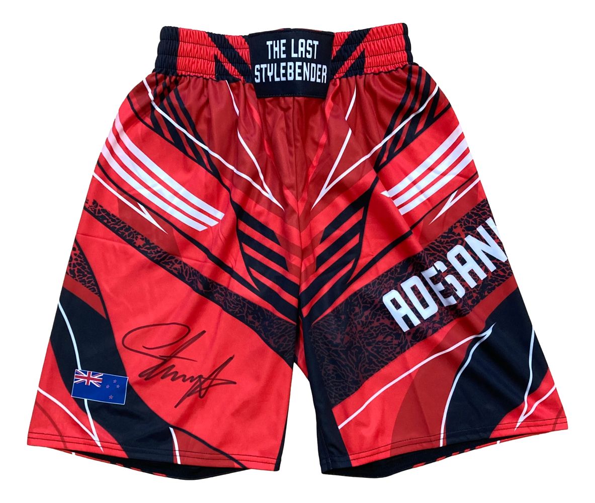 Israel Adesanya Signed Custom Red MMA Fight Shorts - Authentic Collectible for UFC Fans - Perfect for Memorabilia Display, Sports Decor, and MMA Enthusiast Gifts