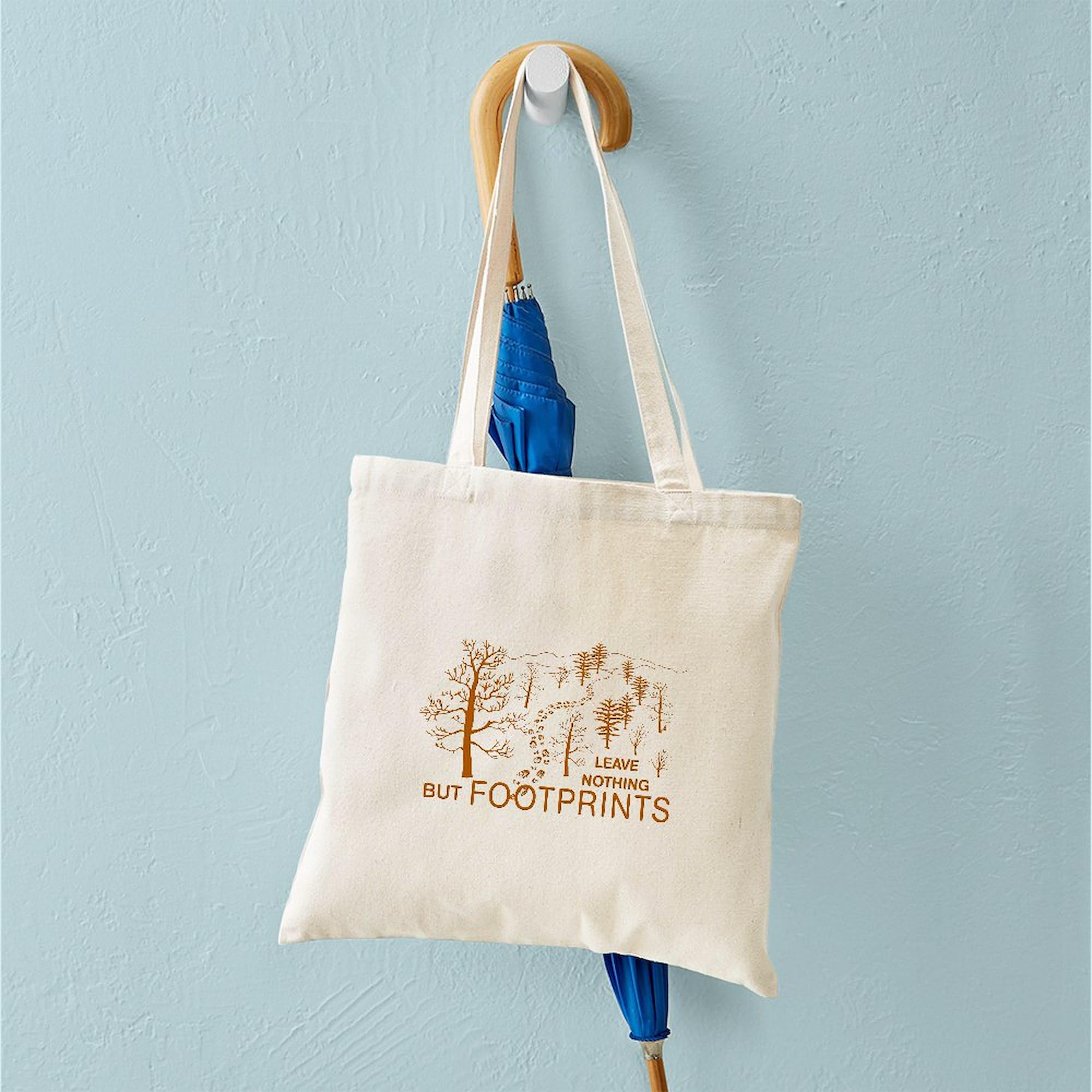 Eco-Friendly Brown Canvas Tote Bag - Reusable Natural Shopping Bag with 'Leave Nothing But Footprints' Print | Perfect for Groceries, Beach Trips & Sustainable Lifestyle