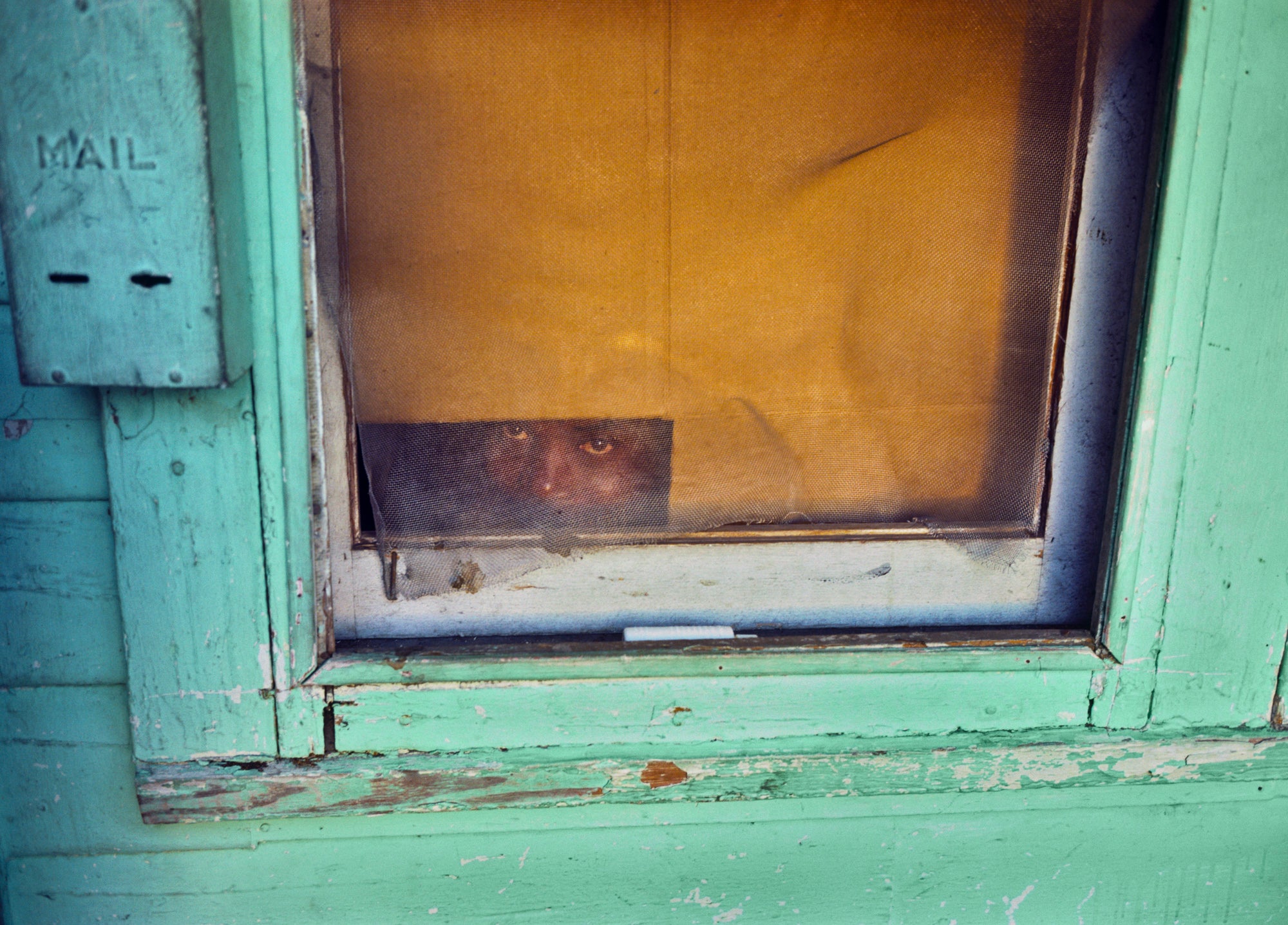 Nathan Benn Editioned Print - Refugee in Hiding, Overtown Miami 1981 | Vintage Photography Artwork for Home & Office Decor