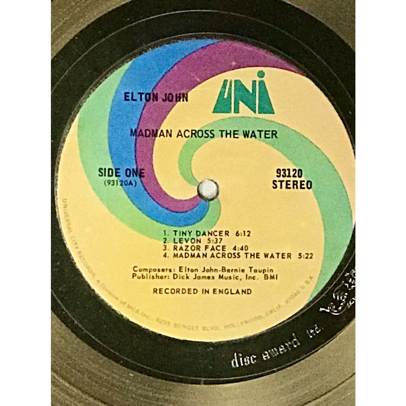 Elton John Madman Across The Water White Matte RIAA Gold LP Award - Rare Collectible Vinyl Record for Bernie Taupin | Perfect for Music Memorabilia Displays & Elton John Fan Collections