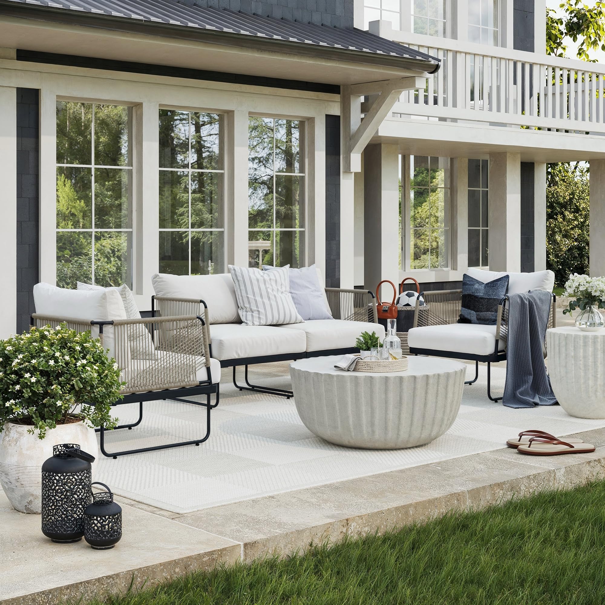 Nathan James Isla Boho Loveseat for Patio - Upholstered Outdoor Sofa with Black Metal Frame, Cream Fabric - Perfect for Backyard, Garden, and Poolside Relaxation