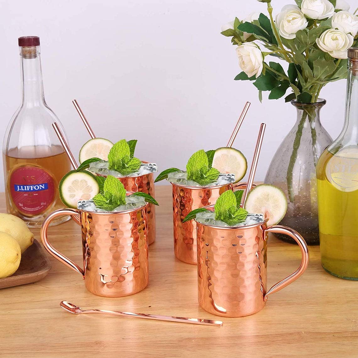 Premium 4-Piece Copper Moscow Mule Mug Set - Authentic Indian Hammered Design, 100% Food-Safe Pure Copper Cups with 4 Cocktail Straws & Stirring Spoon - Perfect for Cocktails, Gifts & Home Bar Decor
