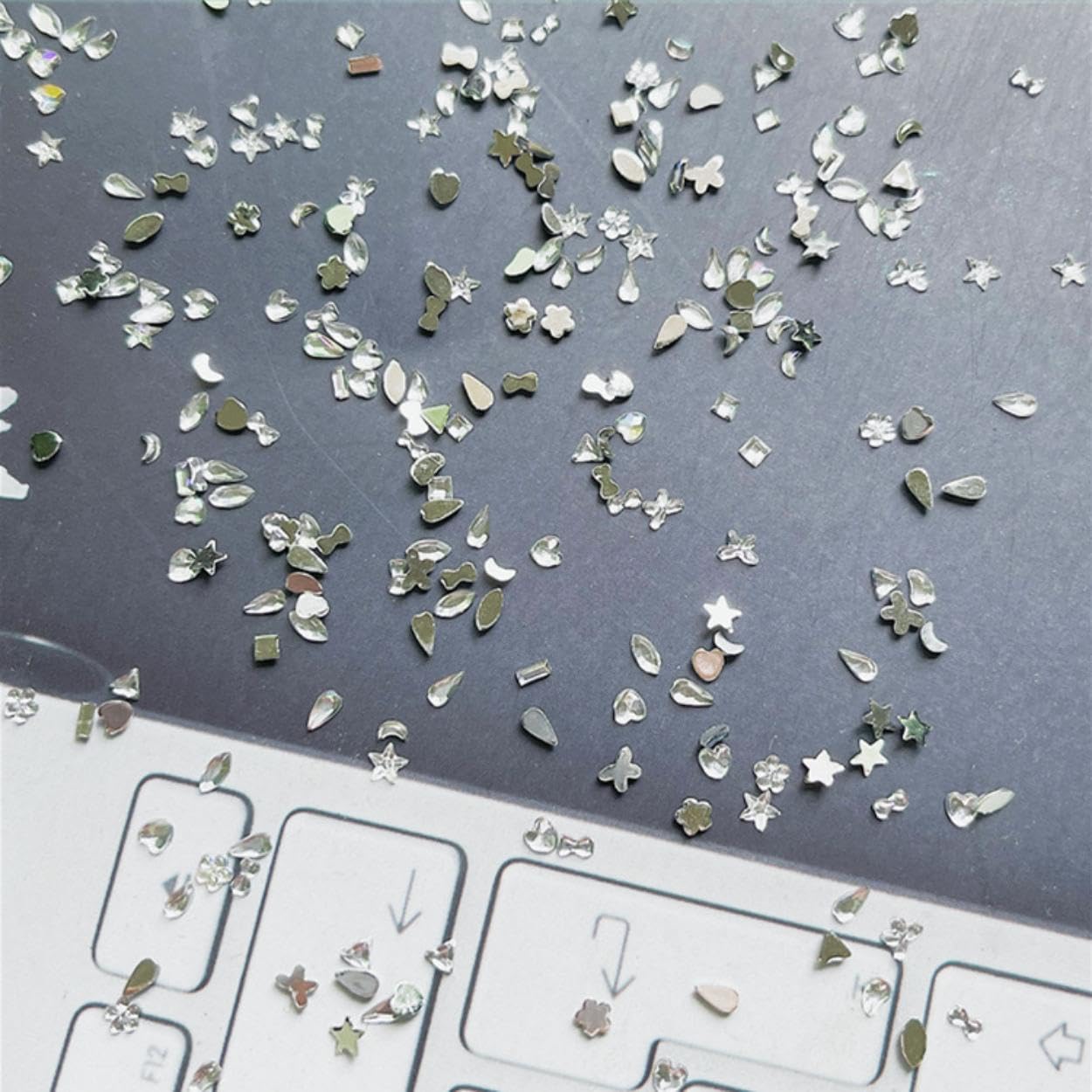 1000PCS Silver Mini Rhinestones for Nail Art - Multi-Shape Flat Back Crystals (Moon, Heart, Star, Flower) - DIY Manicure Gems for Acrylic Nails - Perfect for Women & Girls Nail Decoration - Great for Parties, Weddings, and Special Occasions