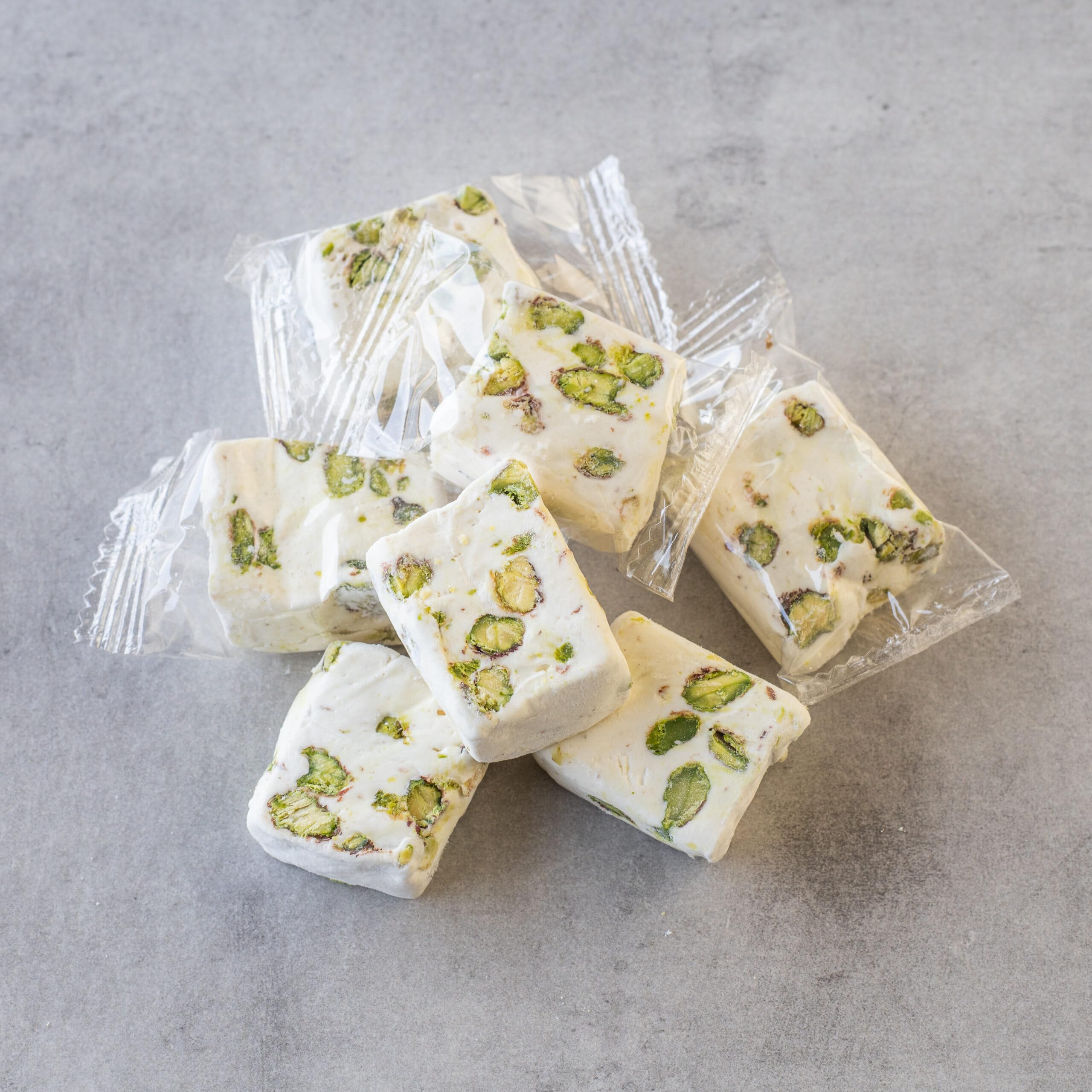 Soft White Pistachio Nougat Candy - 2 Lb Bag of Individually Wrapped Divinity Nougat with Pistachios | Perfect for Gifts, Parties & Holiday Treats