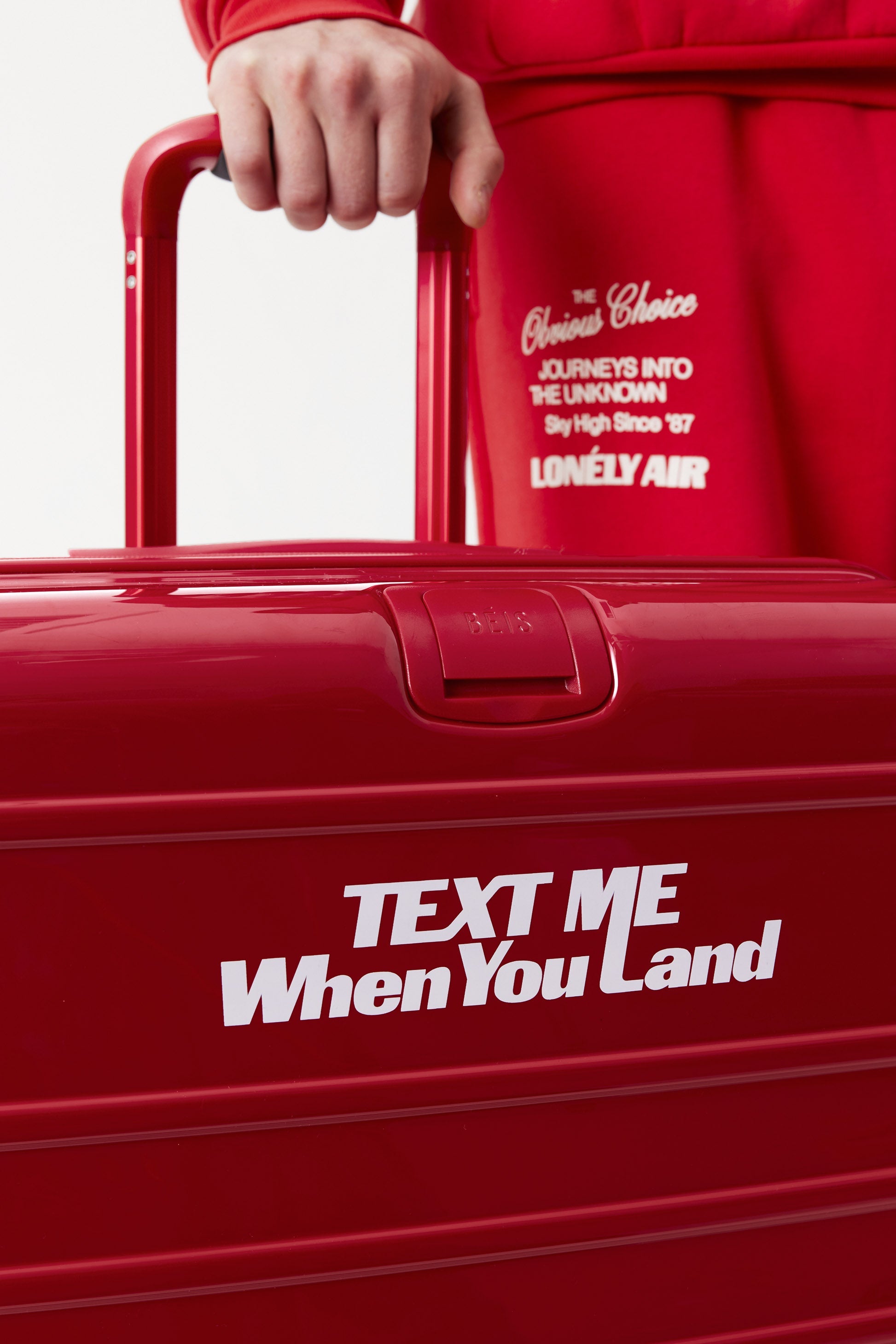Textured Red Medium Check-In Roller Luggage - Perfect for Air Travel & Weekend Getaways
