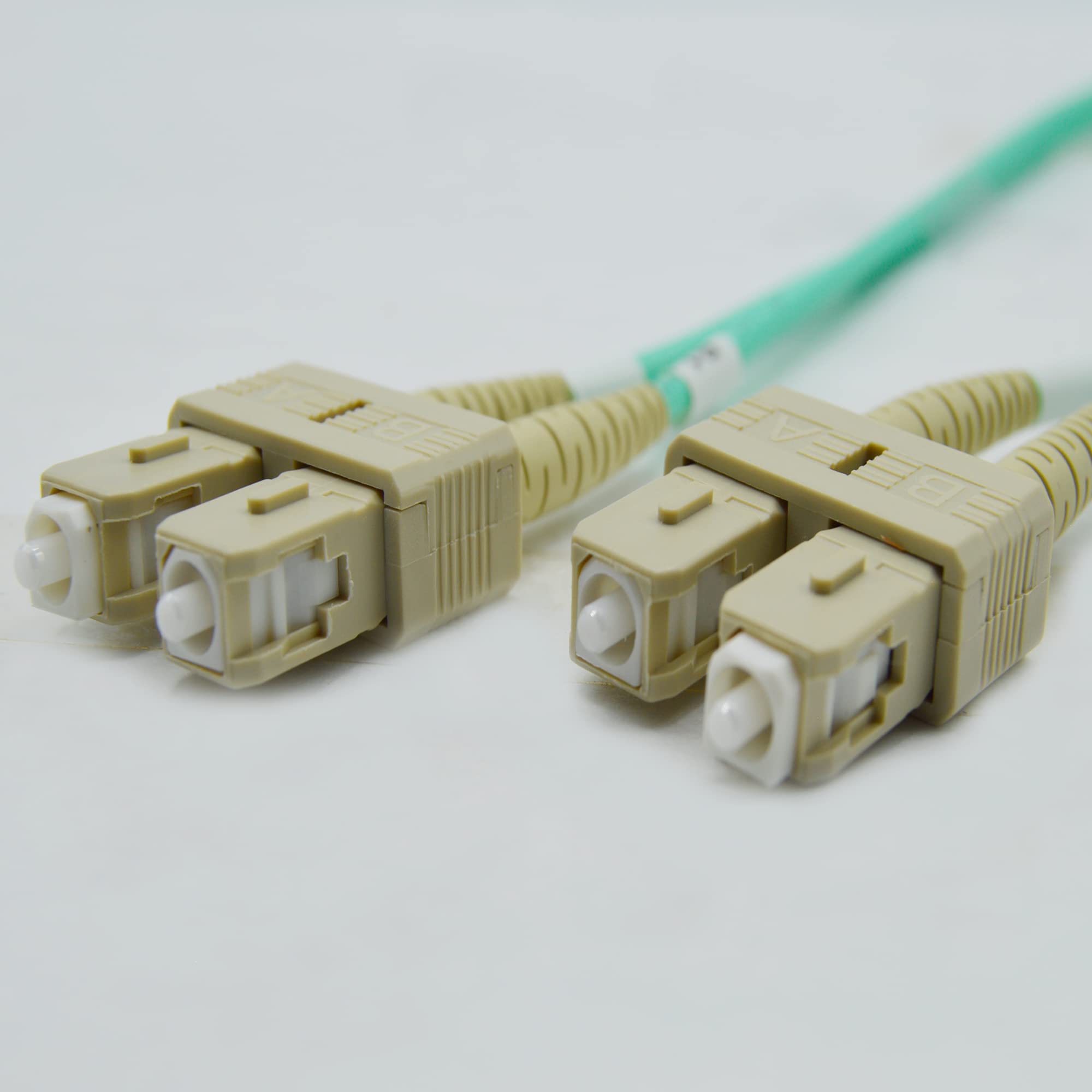 OM4 SC-SC Fiber Optic Cable 100M (328ft) - 100Gb Duplex 50/125 Multimode Jumper for 10G/40G/100G Networks | High-Speed Data Center, Server Room & Telecom Applications | Length Options 0.5M-300M | OFNR Rated Aqua Cable