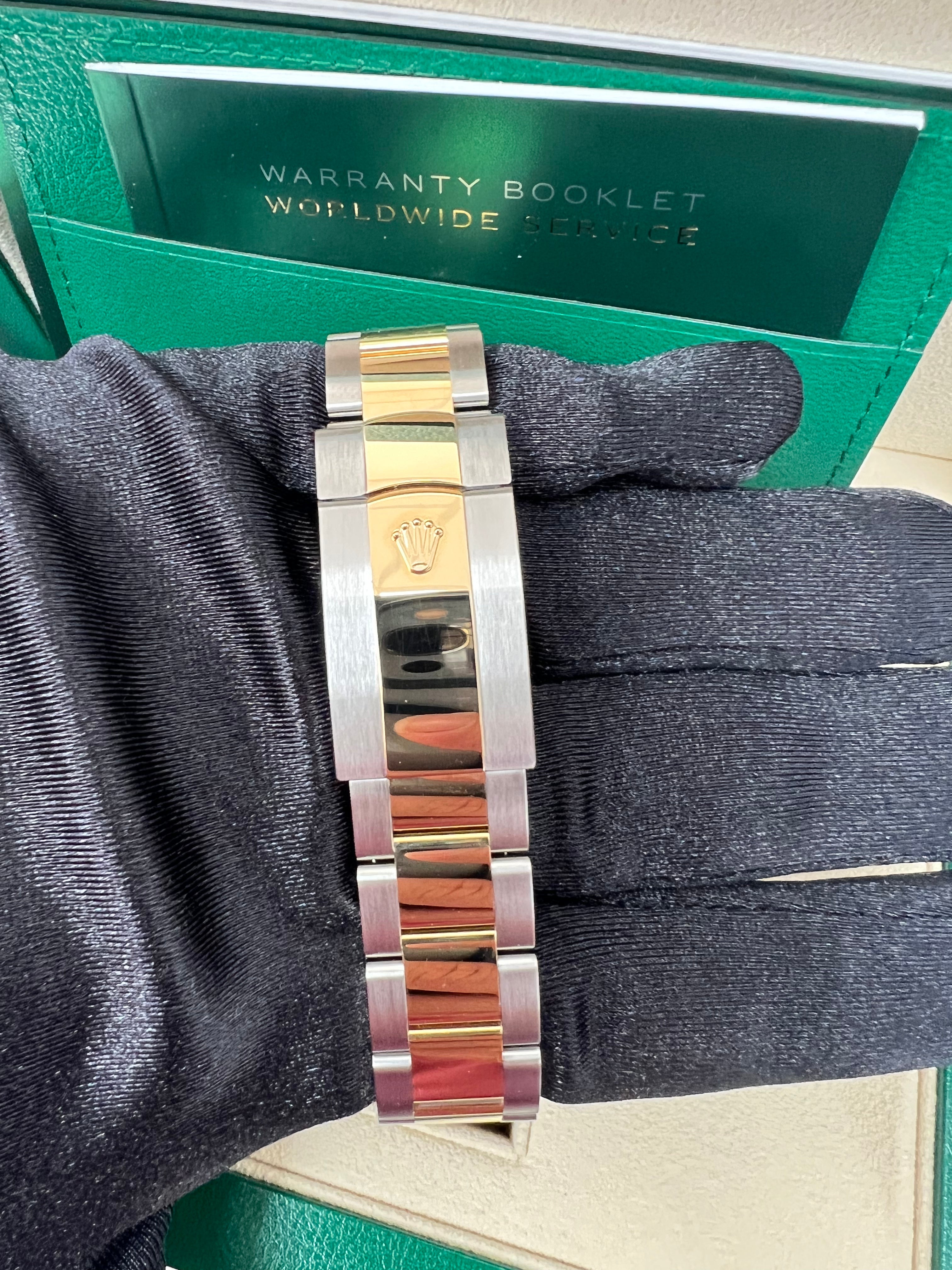 Rolex Sky-Dweller Two-Tone Yellow Gold & Steel Watch with Black Index Dial & Oyster Bracelet (Ref# 326933) - Luxury Timepiece for Business Travelers & Watch Collectors