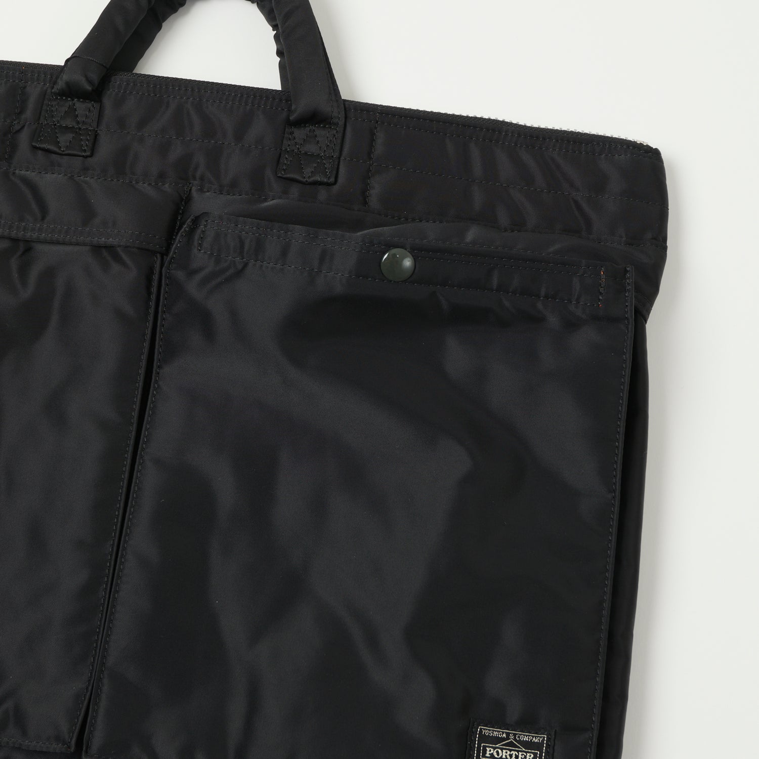 Porter Yoshida & Co. Large Tanker Short Helmet Bag - Durable Black Nylon Travel Duffel for Motorcycle Gear & Outdoor Adventures
