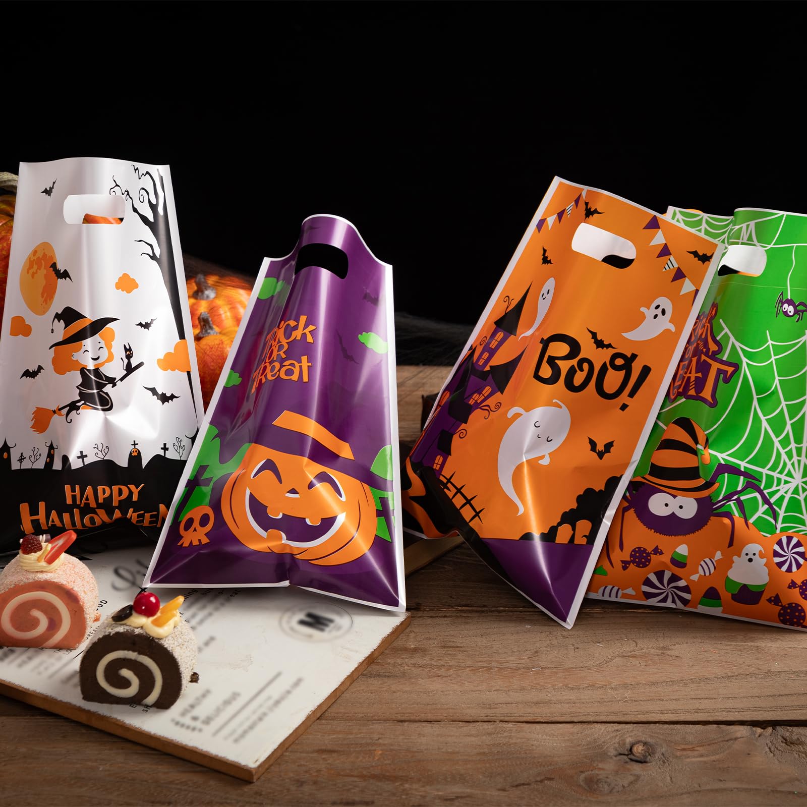 Jocomoni 100Pcs Halloween Goodie Bags with Handles - Plastic Trick or Treat Candy Bags for Halloween Party Favors & Supplies - Perfect for Classroom Treats, Neighborhood Trick-or-Treating & Halloween Events