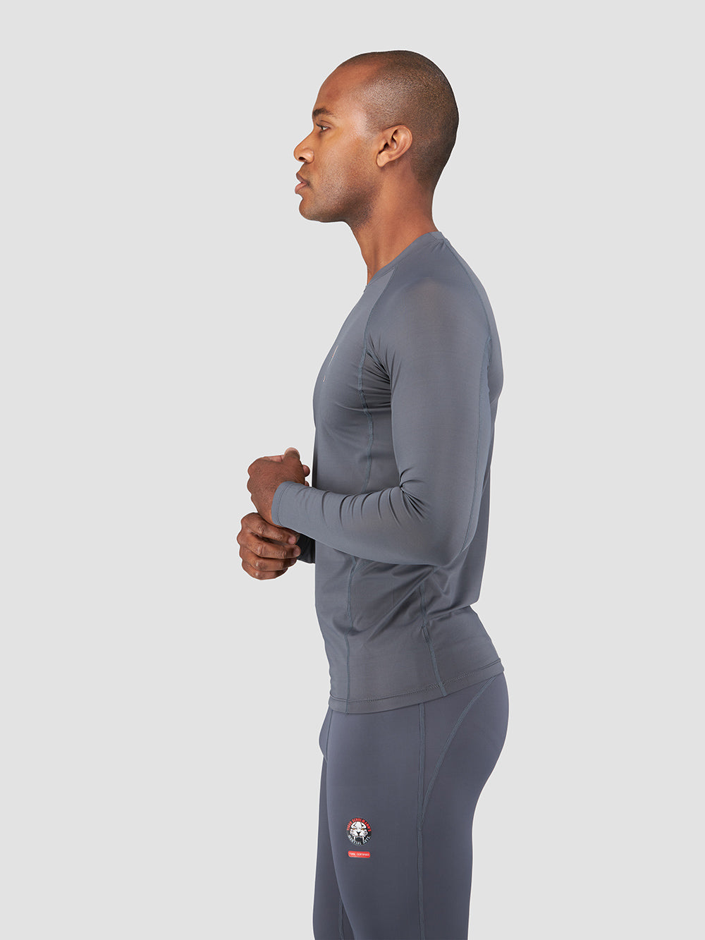 Rebel Rashguard for Men & Women - UPF 50+ Sun Protection, Quick Dry Swim Shirt - Gray - Perfect for Surfing, Swimming, and Beach Activities