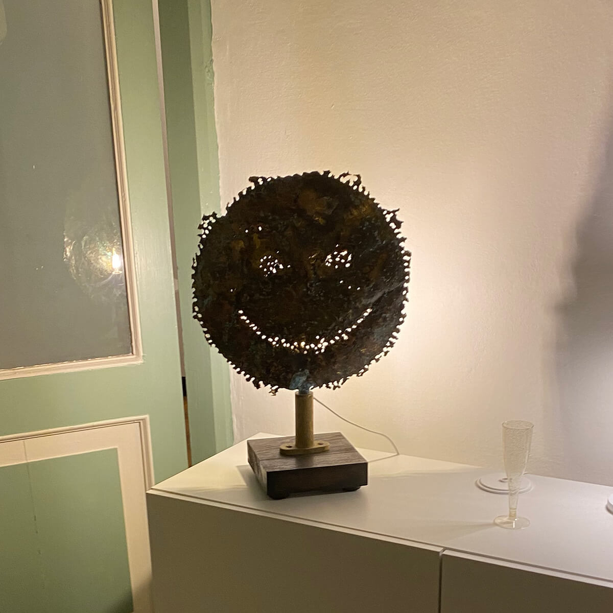 Trippy Tortured Brass Emoticon on Wooden Base - Unique Home Decor & Conversation Piece for Living Room, Office, or Gift Giving