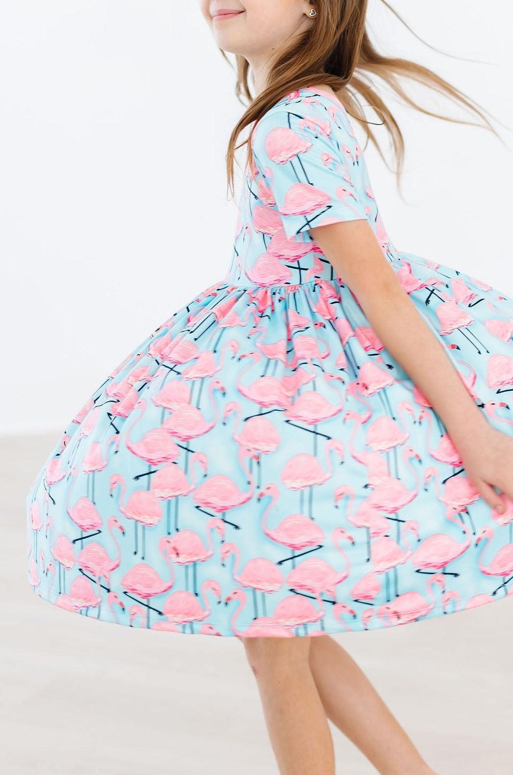 Stylish Pink Flamingo Short Sleeve Pocket Twirl Dress for Women - Perfect for Summer Parties, Beach Vacations & Casual Outings