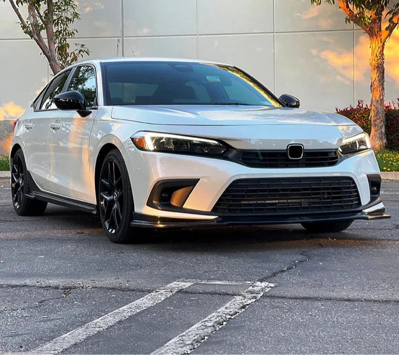 2022-2025 Honda Civic Sedan & Hatchback IK2 Style Front Lip Spoiler - Unpainted Black ABS Plastic Bumper Lip for Enhanced Aerodynamics & Sporty Look - Perfect for Street Racing & Car Shows