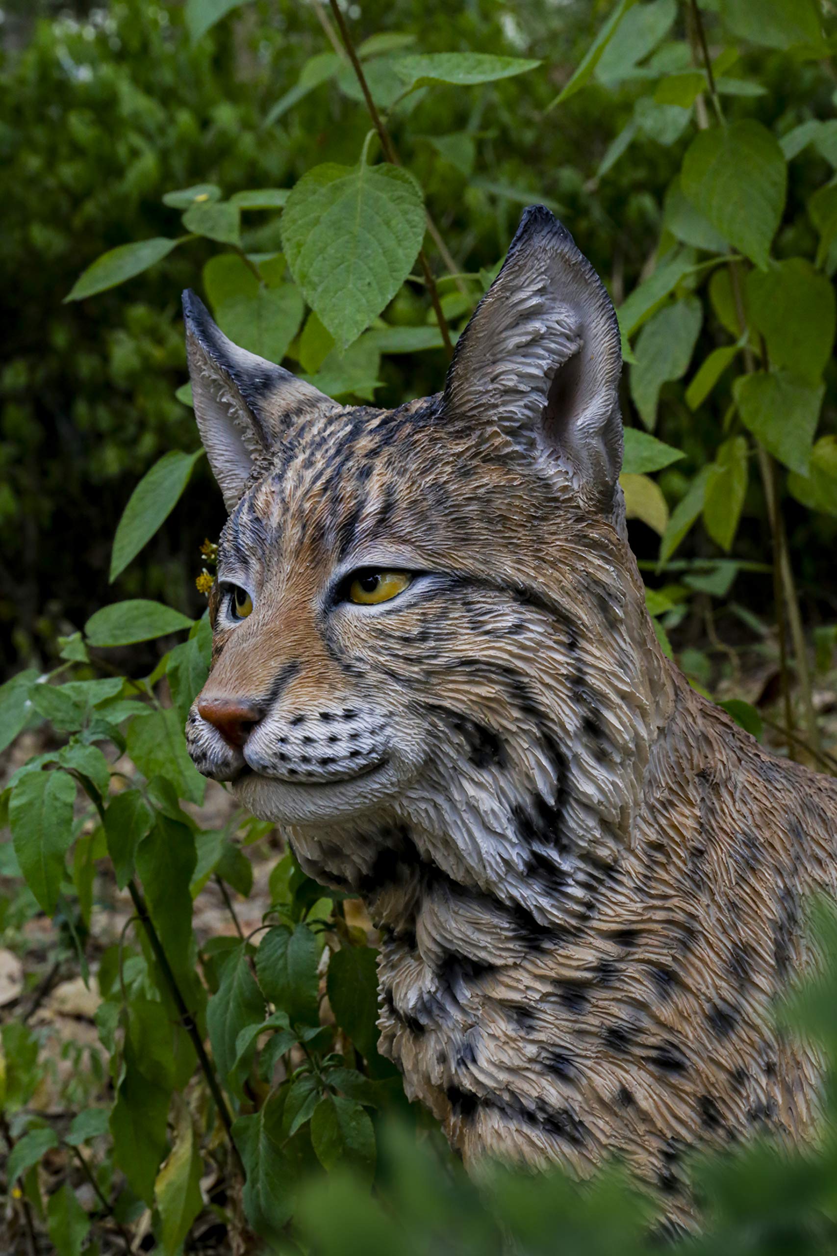Hi-Line Gift Ltd. Sitting Bobcat Statue - Realistic Yellow and Black Decorative Figurine for Home, Office, or Garden Decor