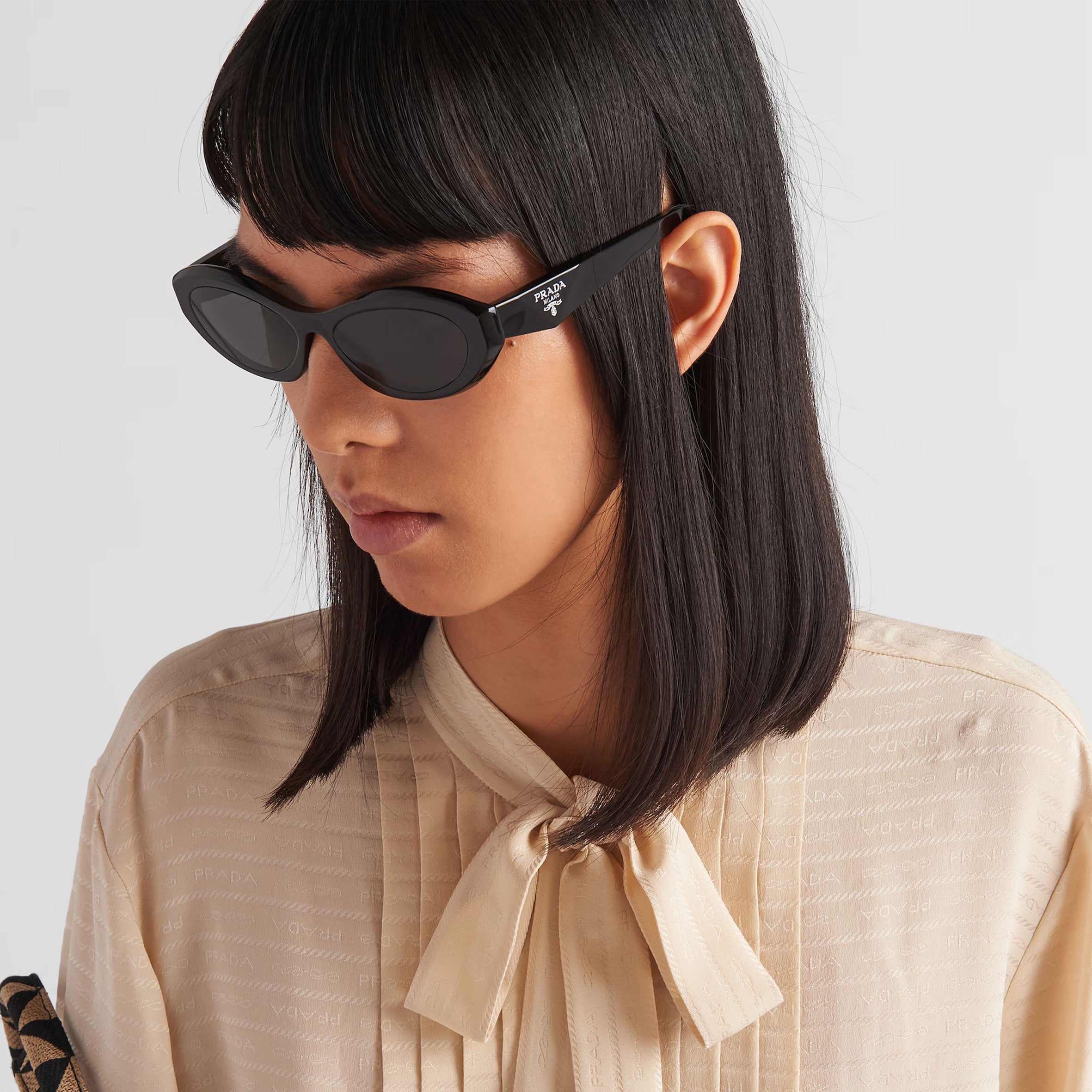 PRADA PR26ZSF Symbole Oval Sunglasses for Women - Black Cat Eye Sunglasses with UV Protection | Perfect for Beach, Driving & Fashion Accessories
