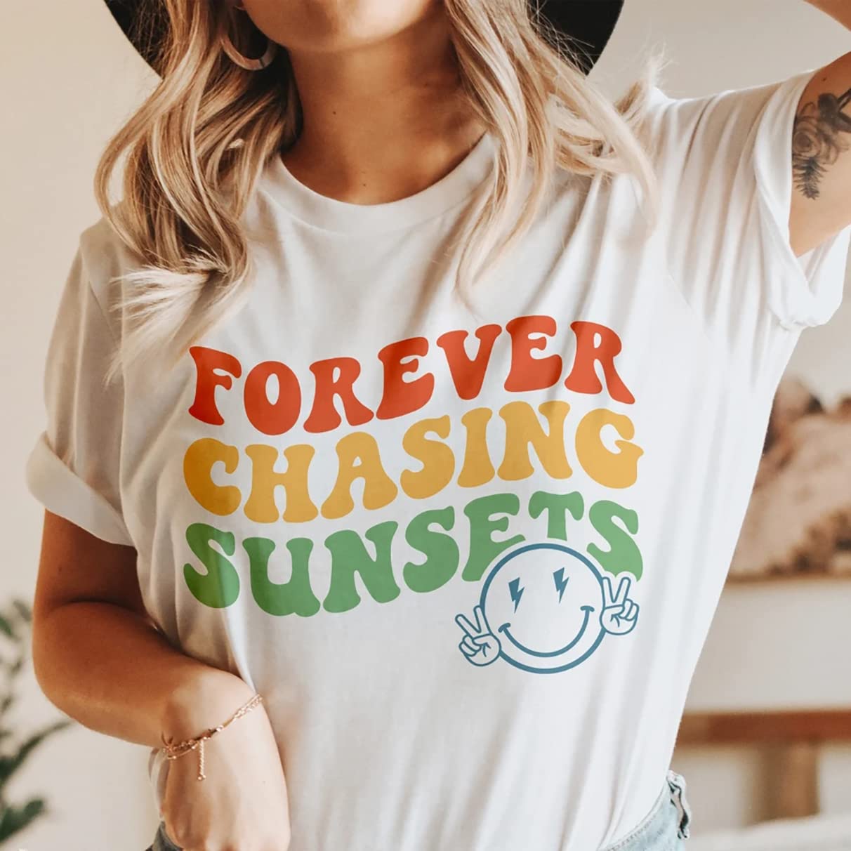 Forever Chasing Sunsets T-Shirt - Trendy Wavy Text & Happy Face Design - Women's Casual Beach Vacation & Road Trip Tee - Perfect for Summer Travel, Music Festivals and Outdoor Adventures