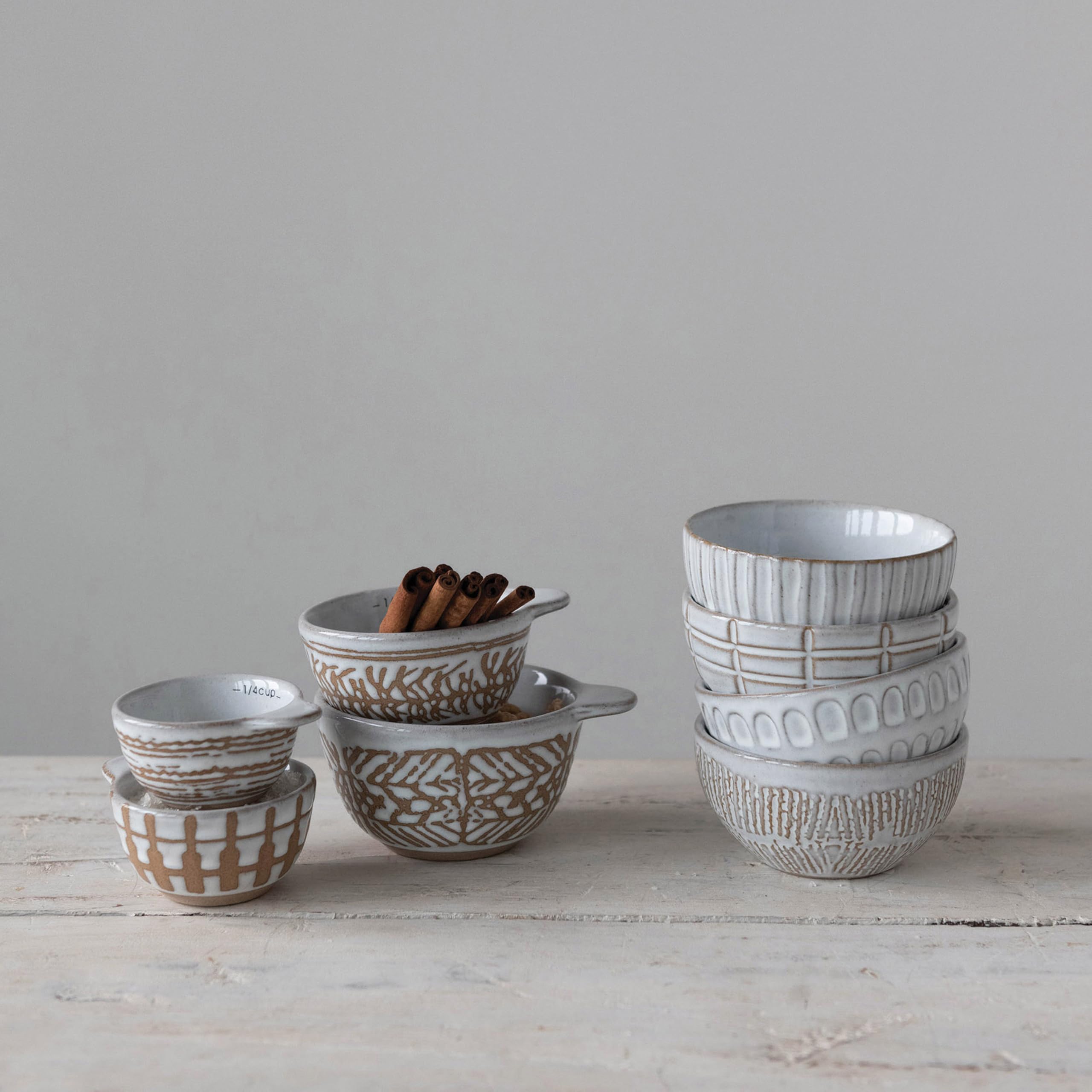 Creative Co-Op White Stoneware Measuring Cups Set of 4 with Wax Relief Pattern - 4.75