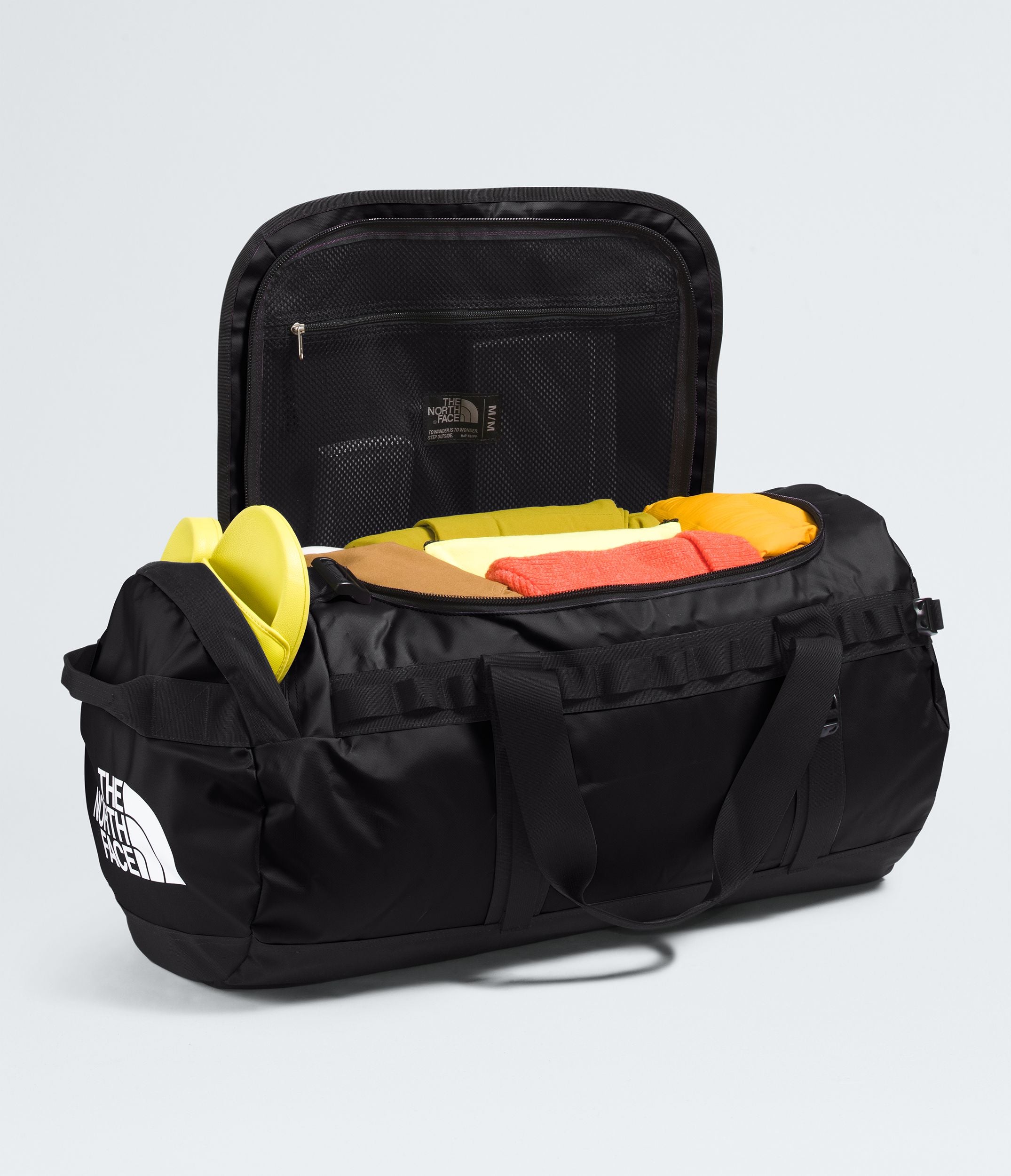 The North Face Base Camp Duffel Bag - Medium Size Travel Duffel for Camping, Hiking & Outdoor Adventures - Water-Resistant Gear Bag for Gym, Work & Weekend Trips