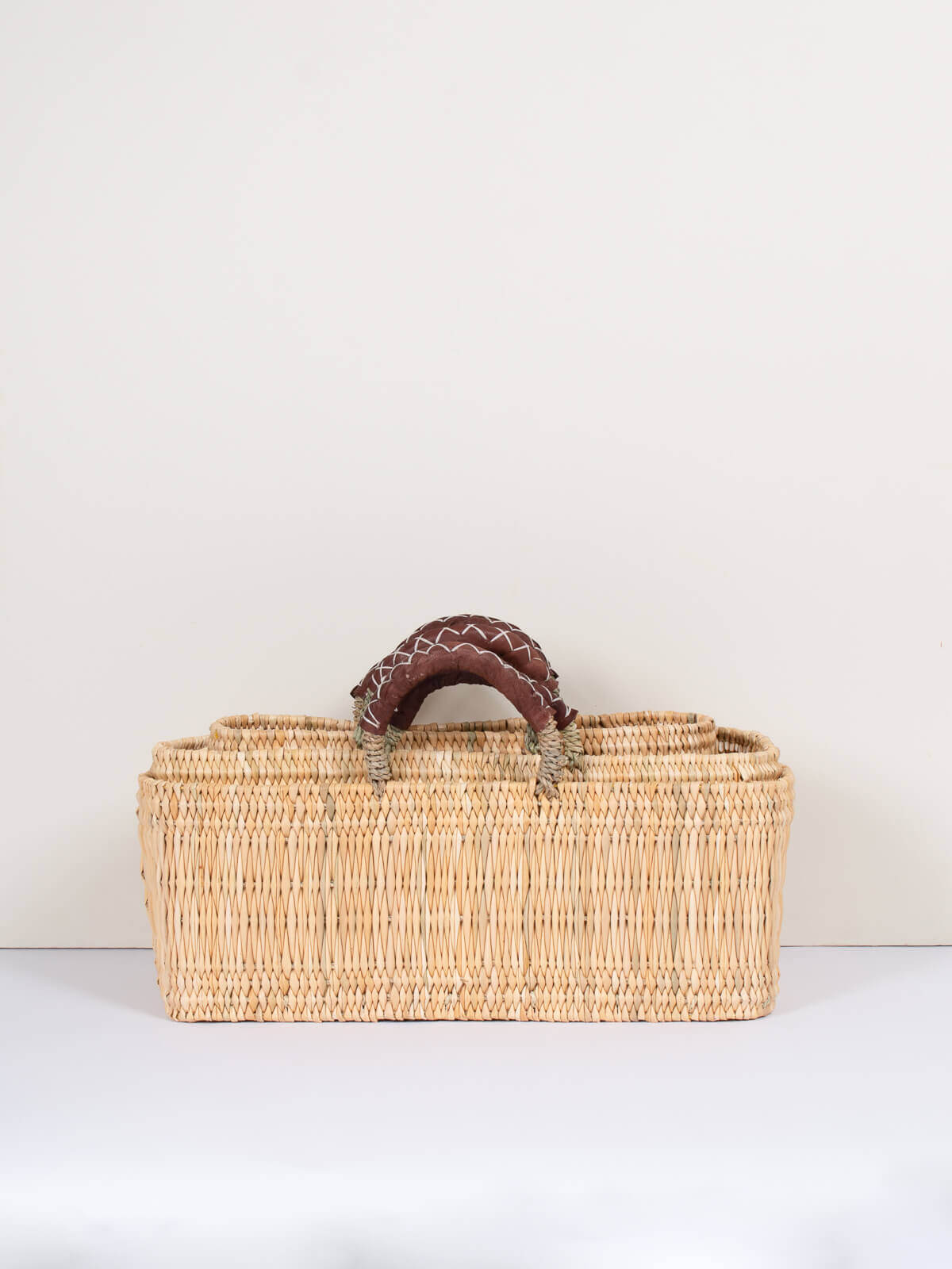 Handwoven Reed Basket with Genuine Leather Handles - Natural Woven Storage Bin for Home Decor, Laundry, or Picnic Basket - Perfect for Organizing Blankets, Toys, and More