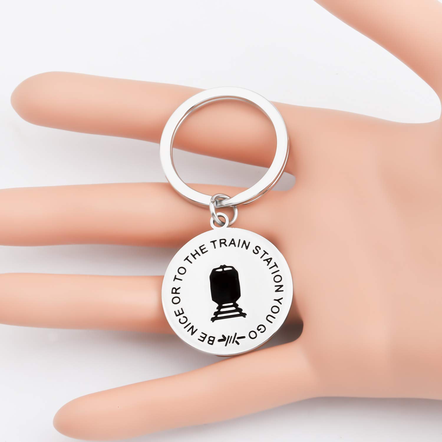 Funny TV Show Inspired Keychain - 'Be Nice Or To The Train Station You Go' Quote - Perfect Gift for TV Show Fans & Pop Culture Enthusiasts - Great for Keyrings, Backpacks, and Fan Collections