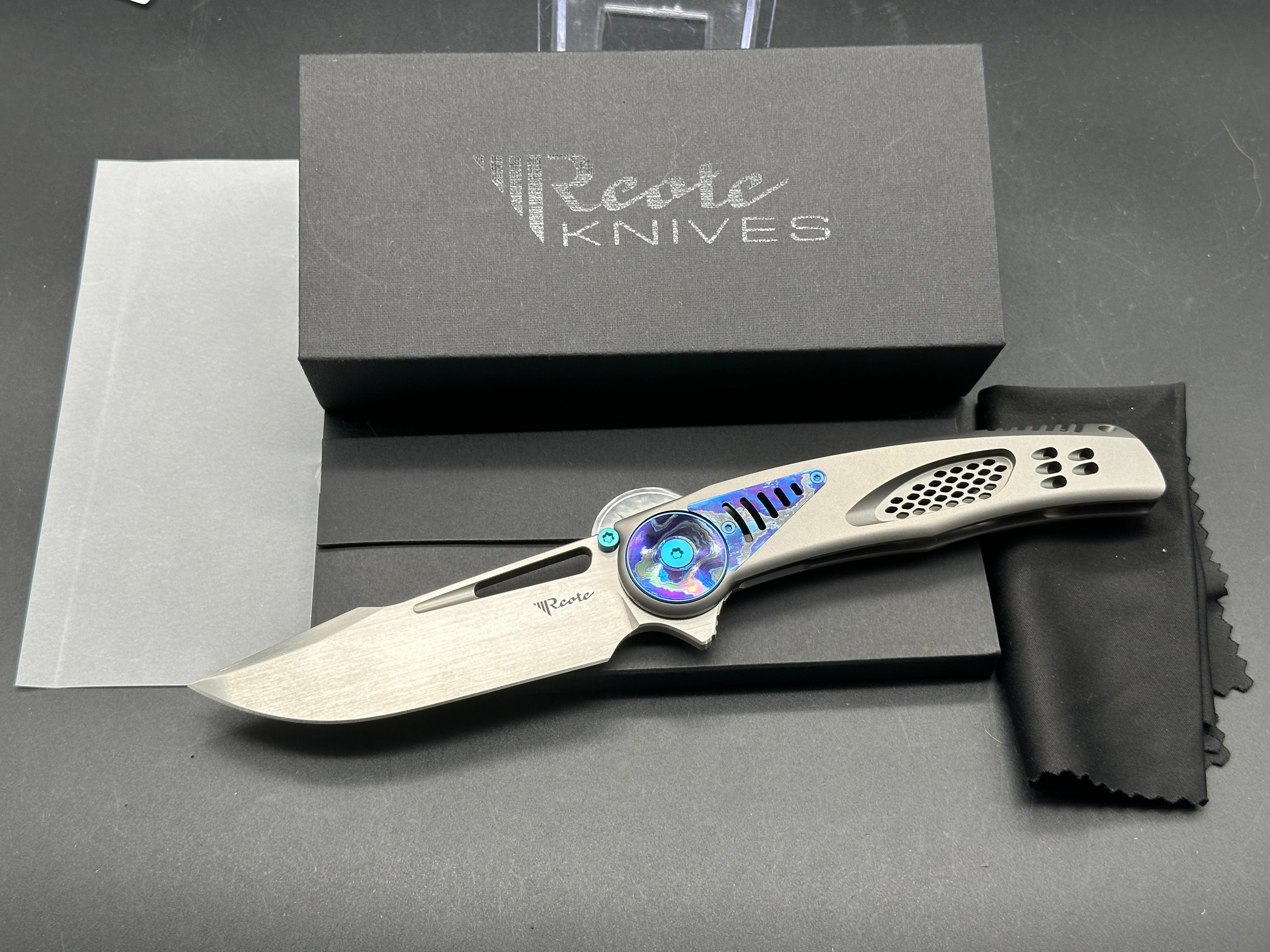 Reate Knives & Alvin Lee GTR - Grey Milled Integral Titanium Handle with Zirconium Inlays & Blue Anodized Accents - Premium EDC Folding Knife for Outdoor, Camping & Everyday Carry