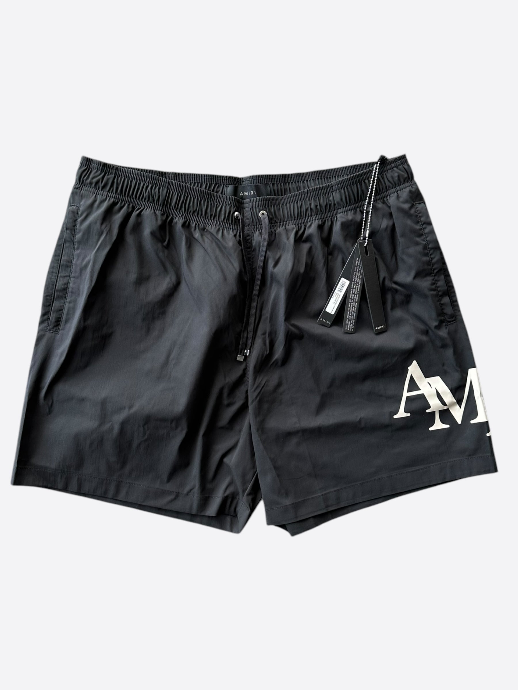 Amiri Black & White Staggered Logo Swim Shorts for Men - Premium Beachwear & Poolside Comfort - Perfect for Summer Vacations, Beach Parties and Resort Getaways